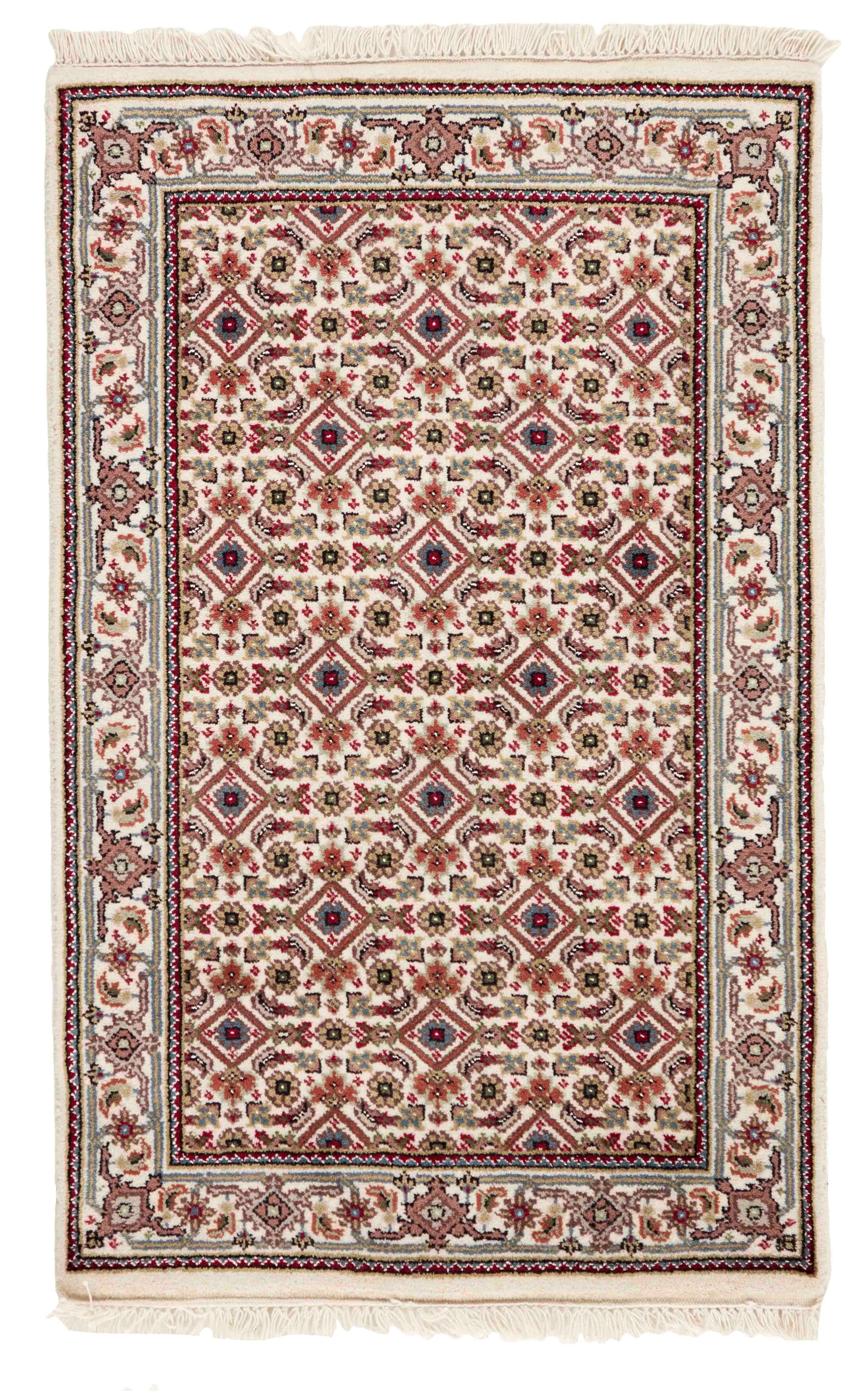 Authentic Oriental rug with traditional geometric and floral design in beige, blue, green and black