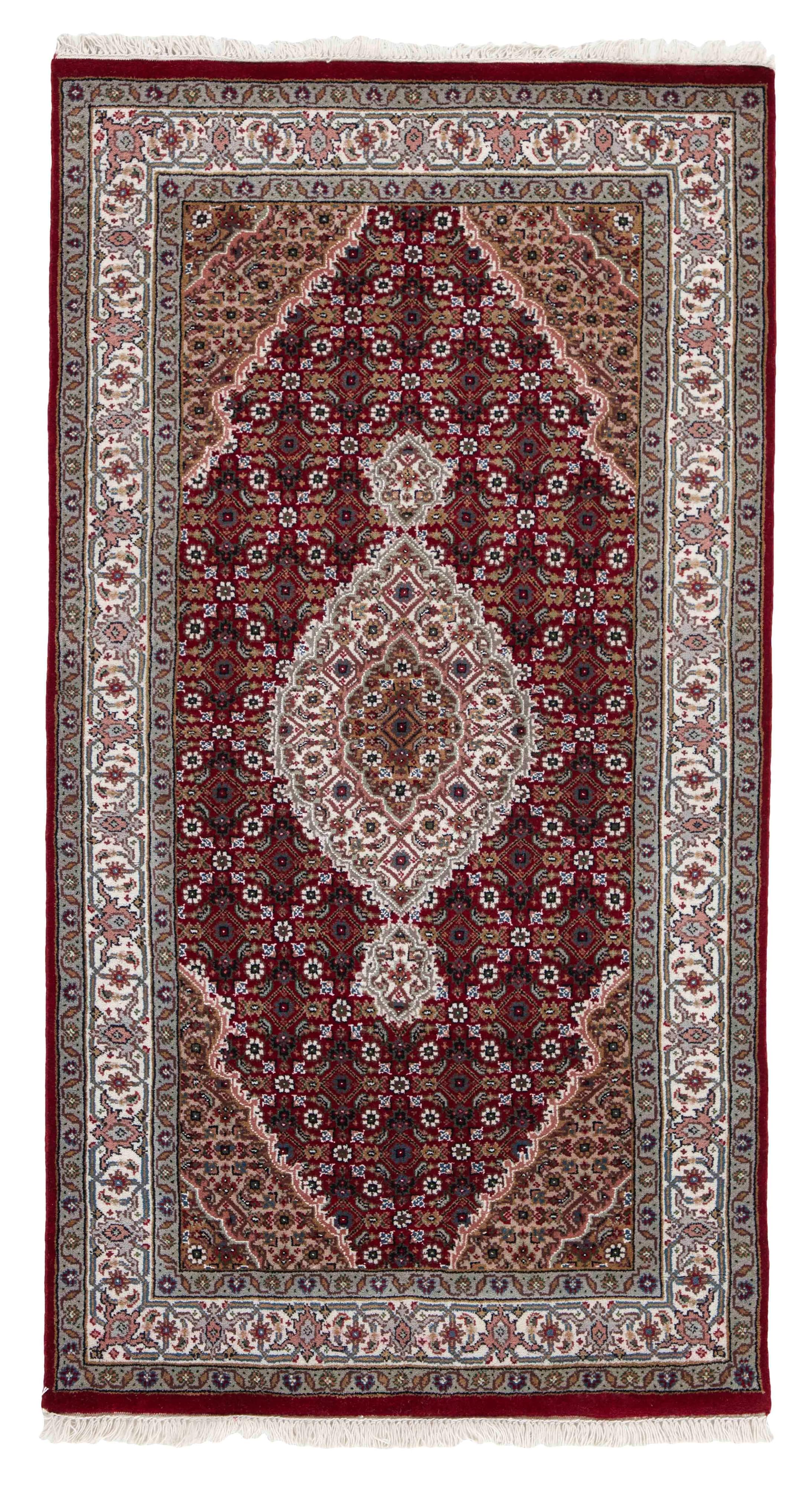 Authentic Oriental rug with traditional geometric and floral design in beige, blue, green and black