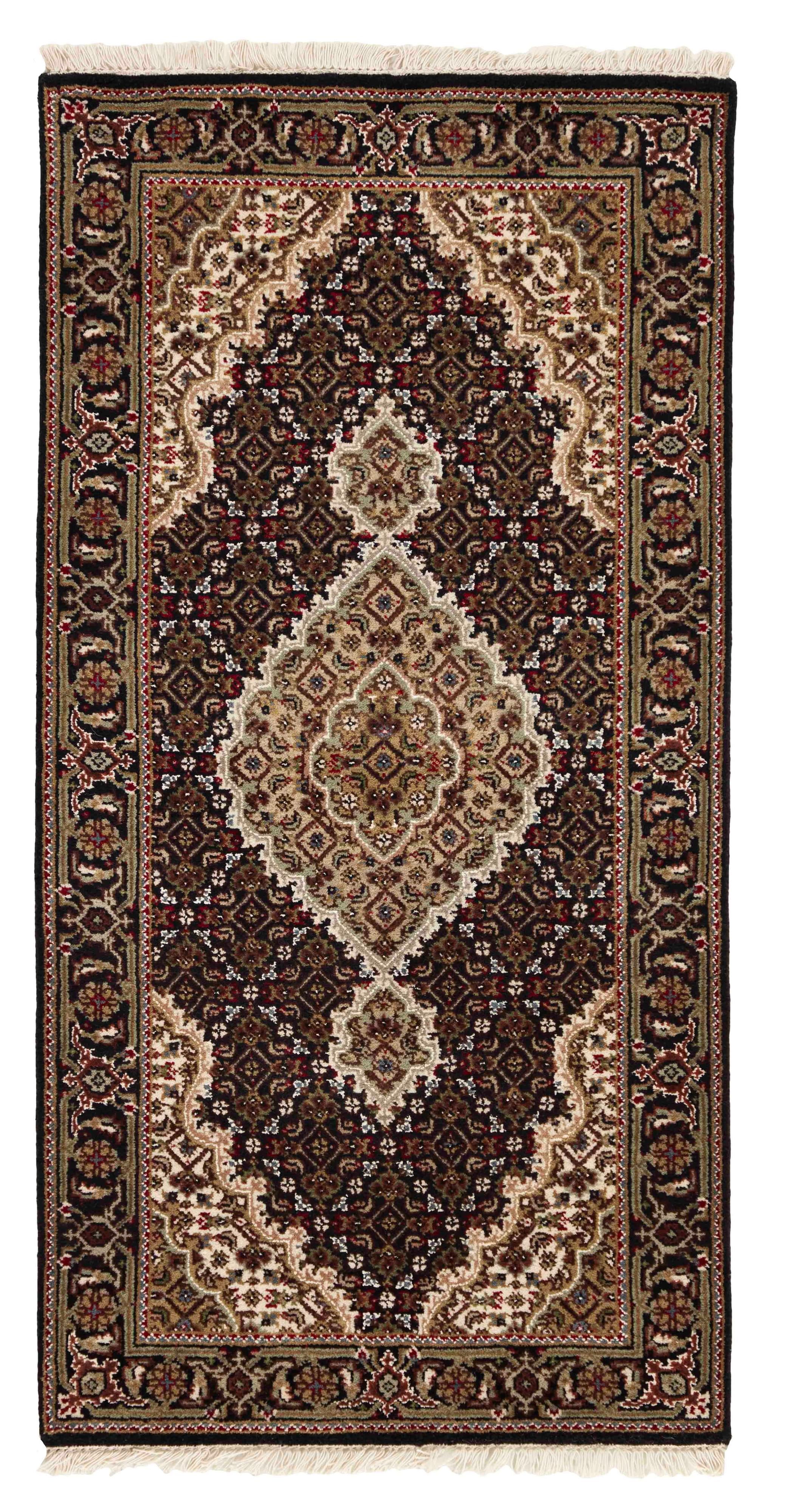 Authentic Oriental rug with traditional geometric and floral design in beige, blue, green and black