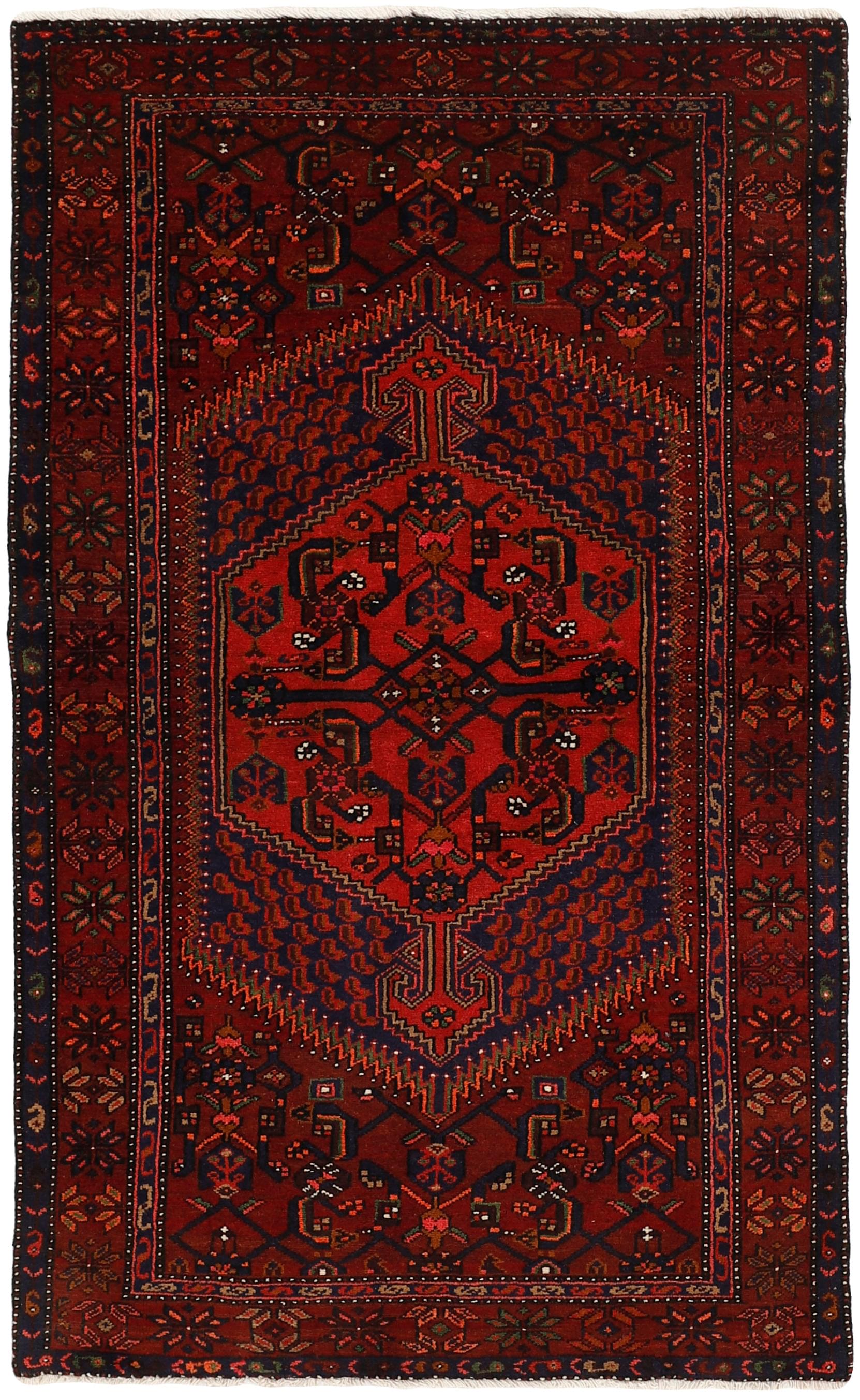 Authentic persian rug with stylised geometric design in red