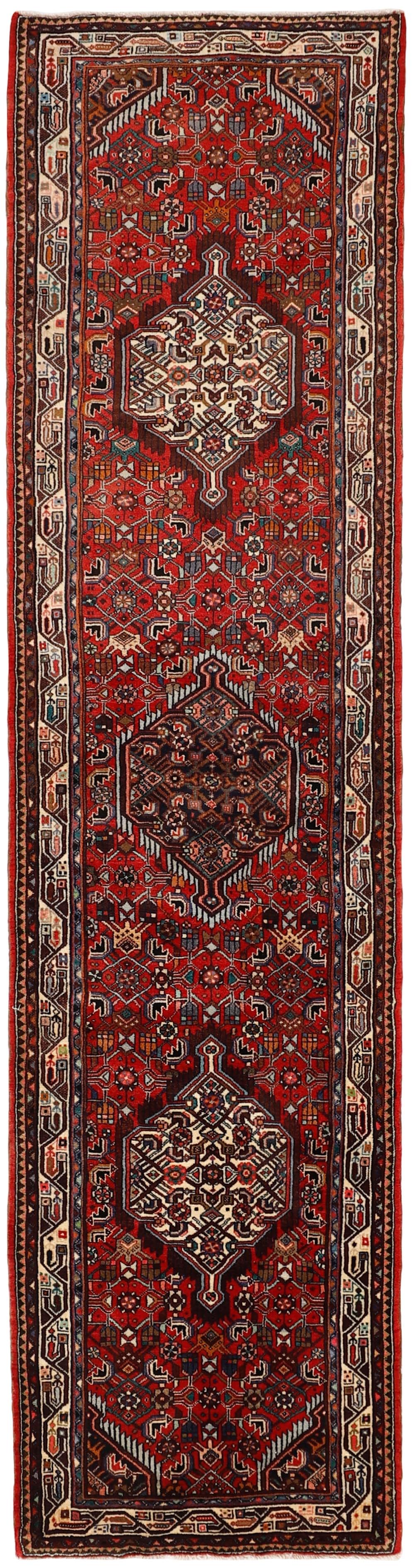 Red and black traditional persian runner with floral design