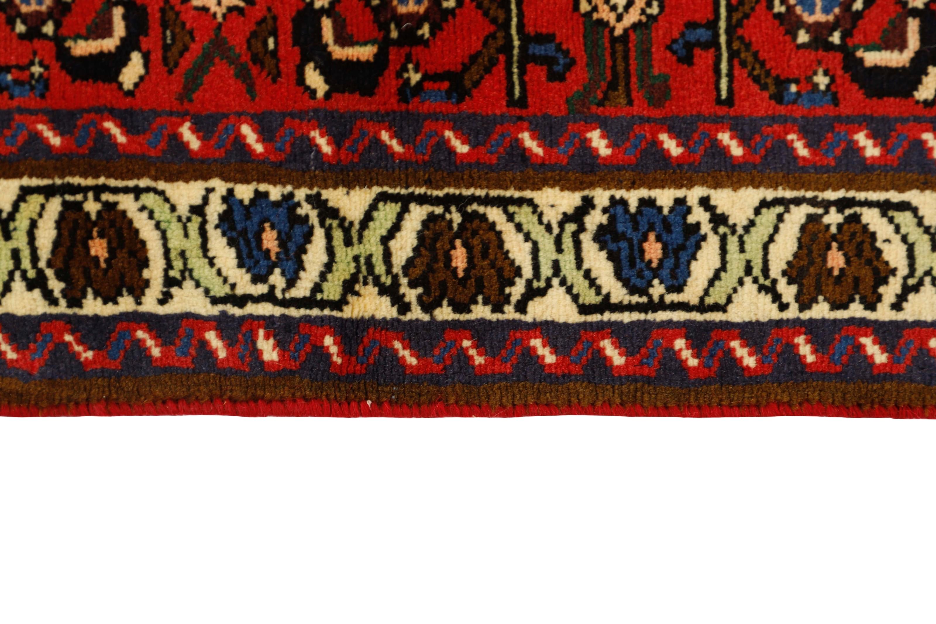 Red and black traditional persian rug with floral design