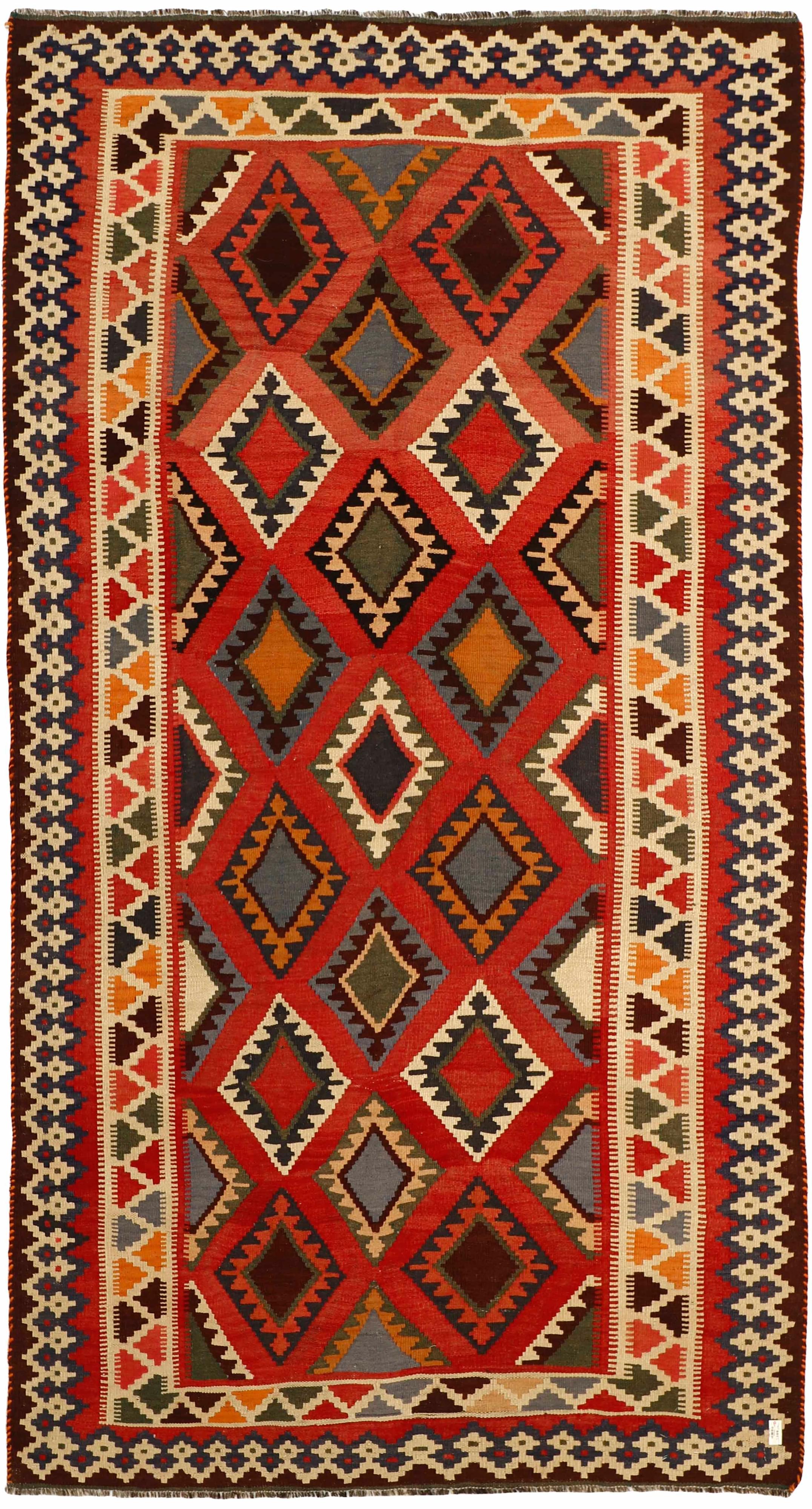 Authentic persian kelim flatweave rug with traditional stripe design in red, blue and black