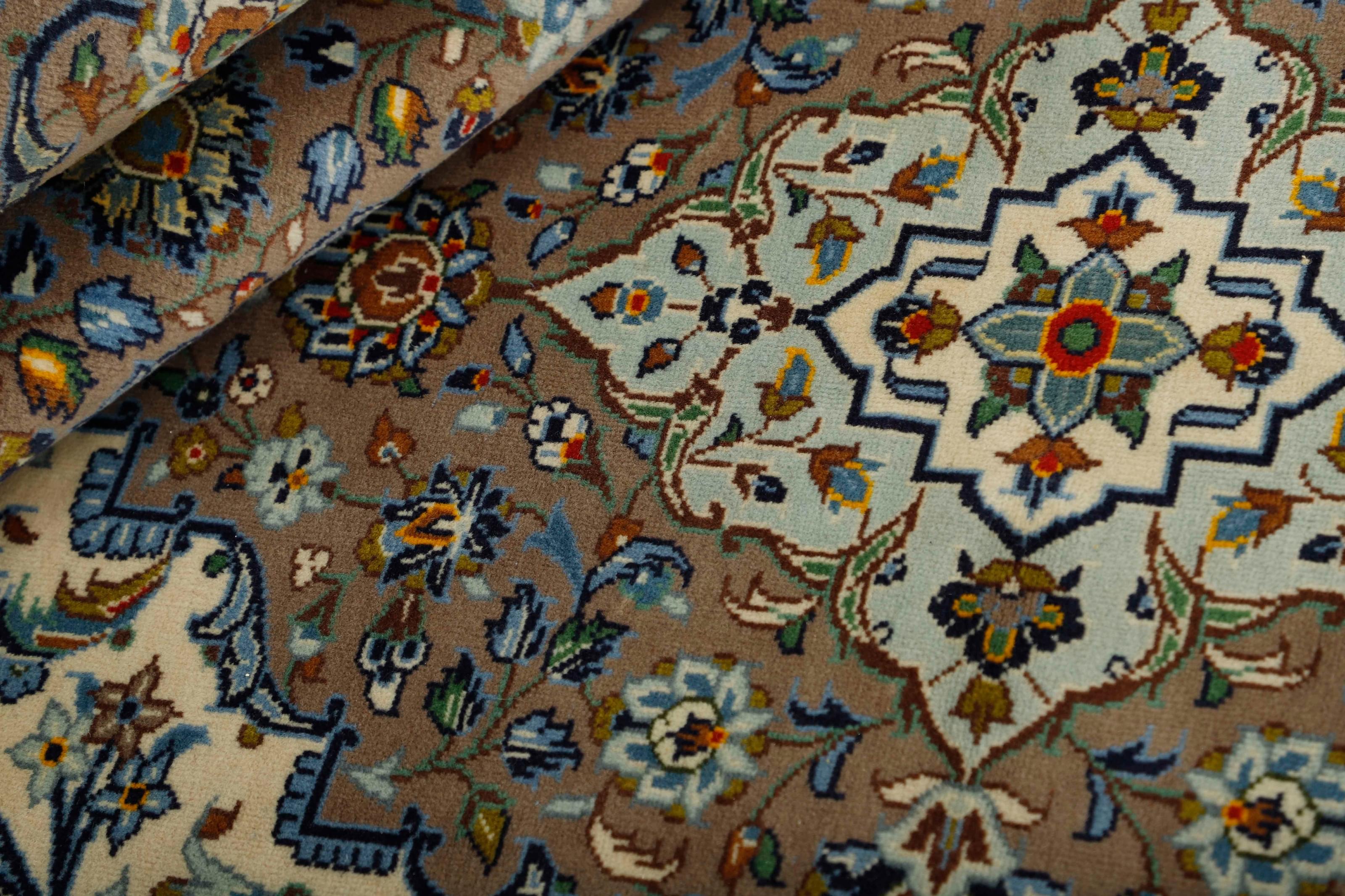 Authentic persian rug with traditional floral design in beige and blue