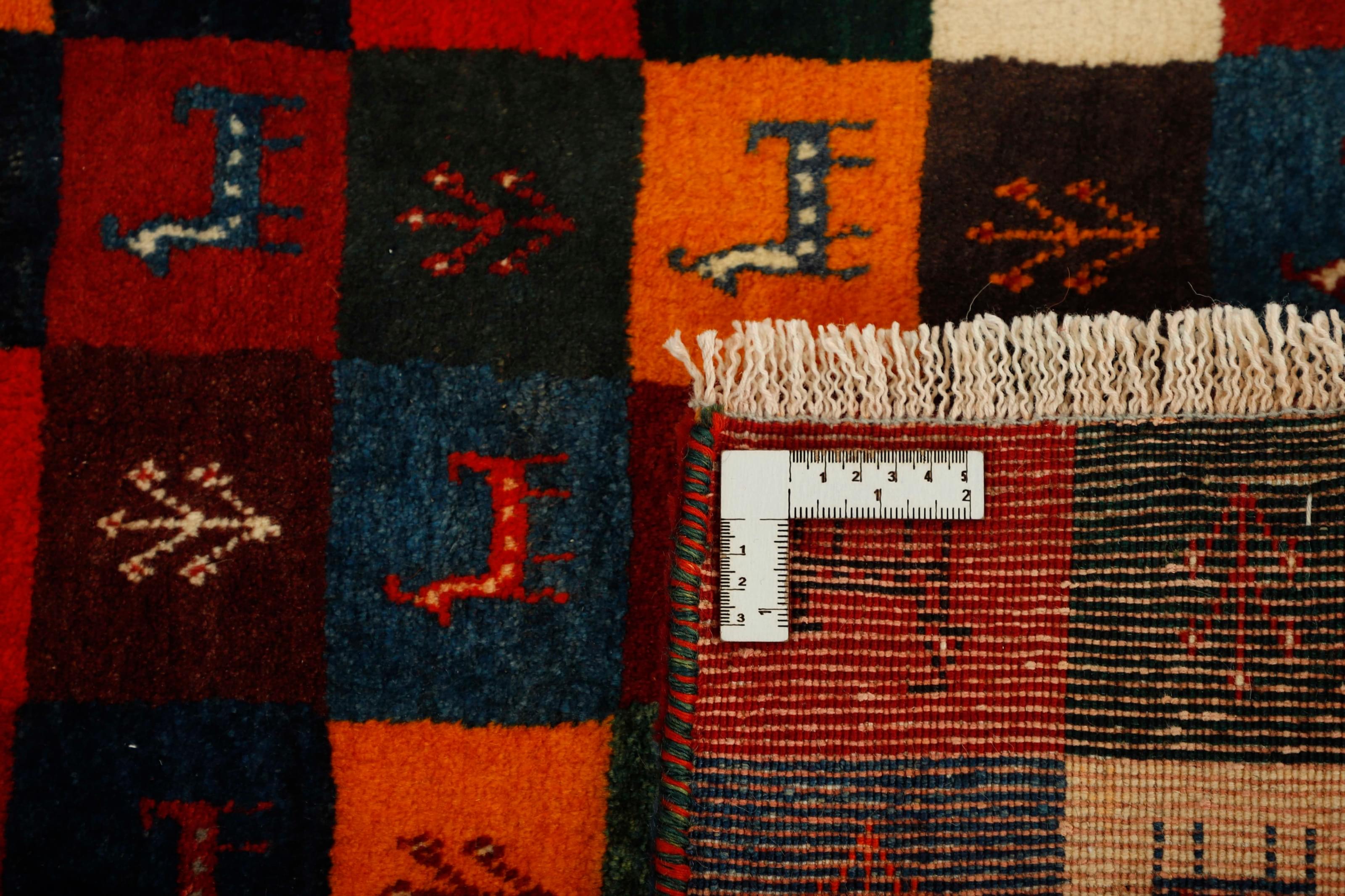 Authentic Persian wool rug with a multicolour geometric design