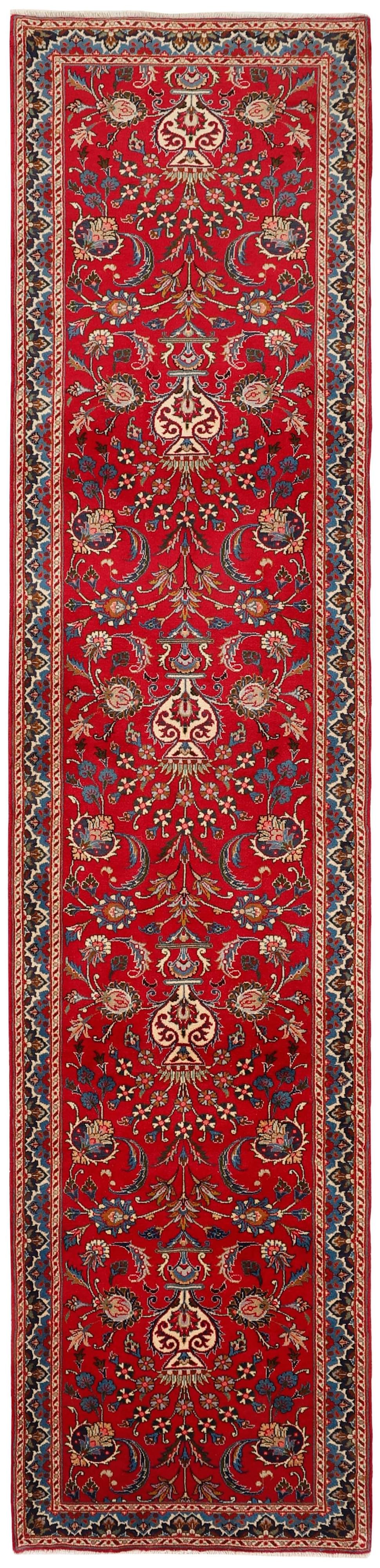 authentic persian runner with a traditional floral design in red