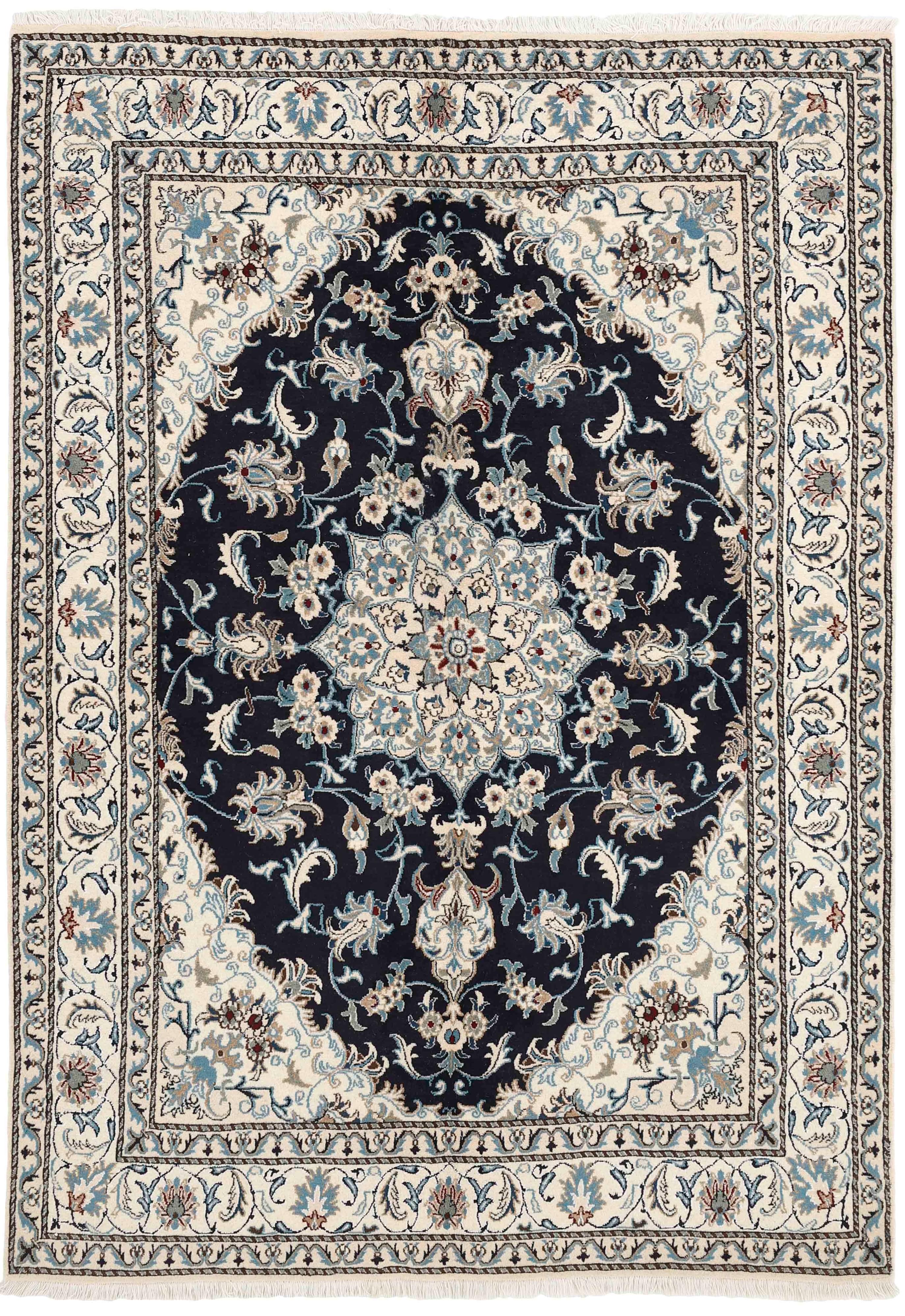 Authentic persian rug with a traditional floral design in cream, blue and black