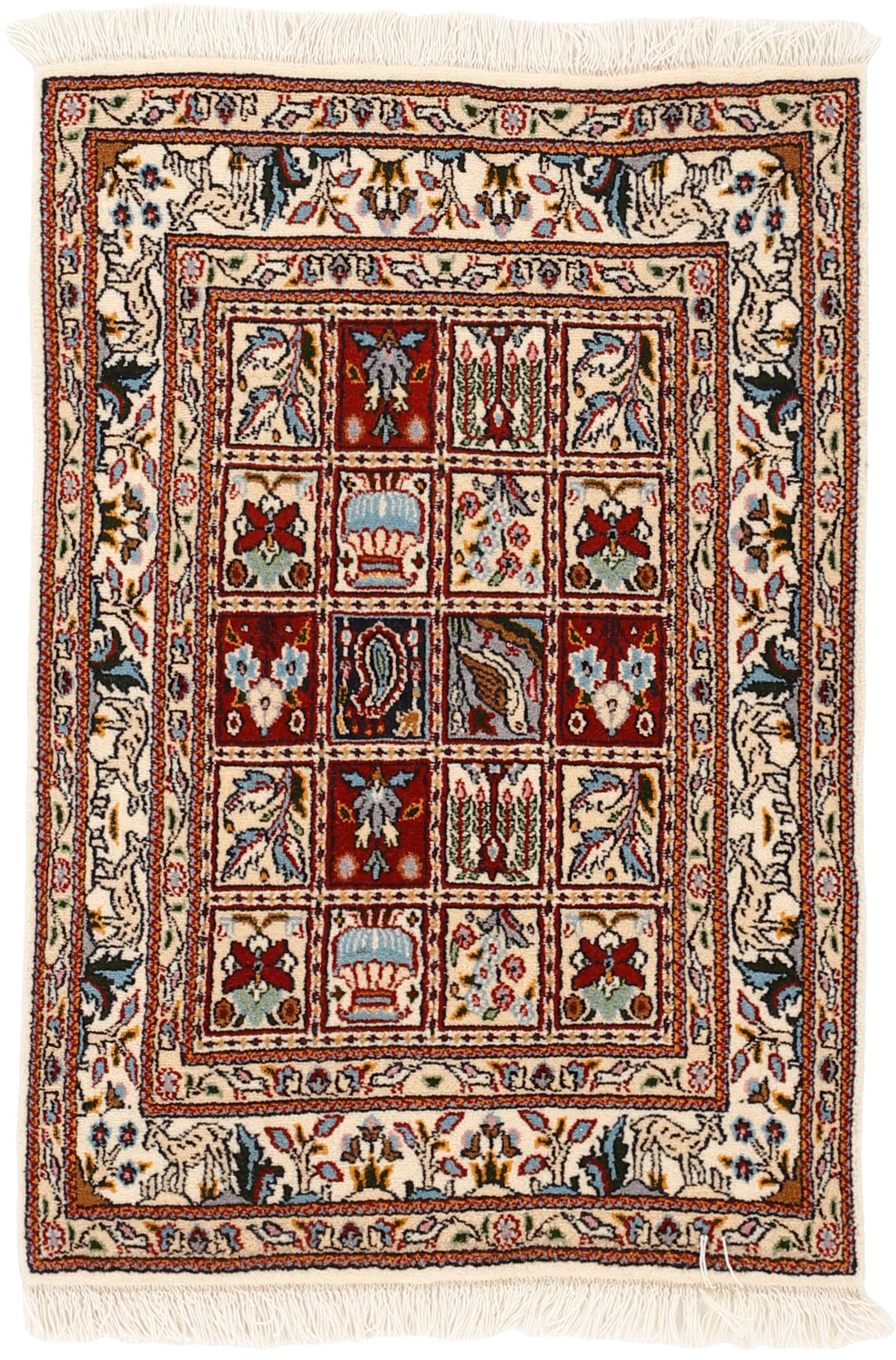 authentic persian rug with floral pattern in beige, blue and red