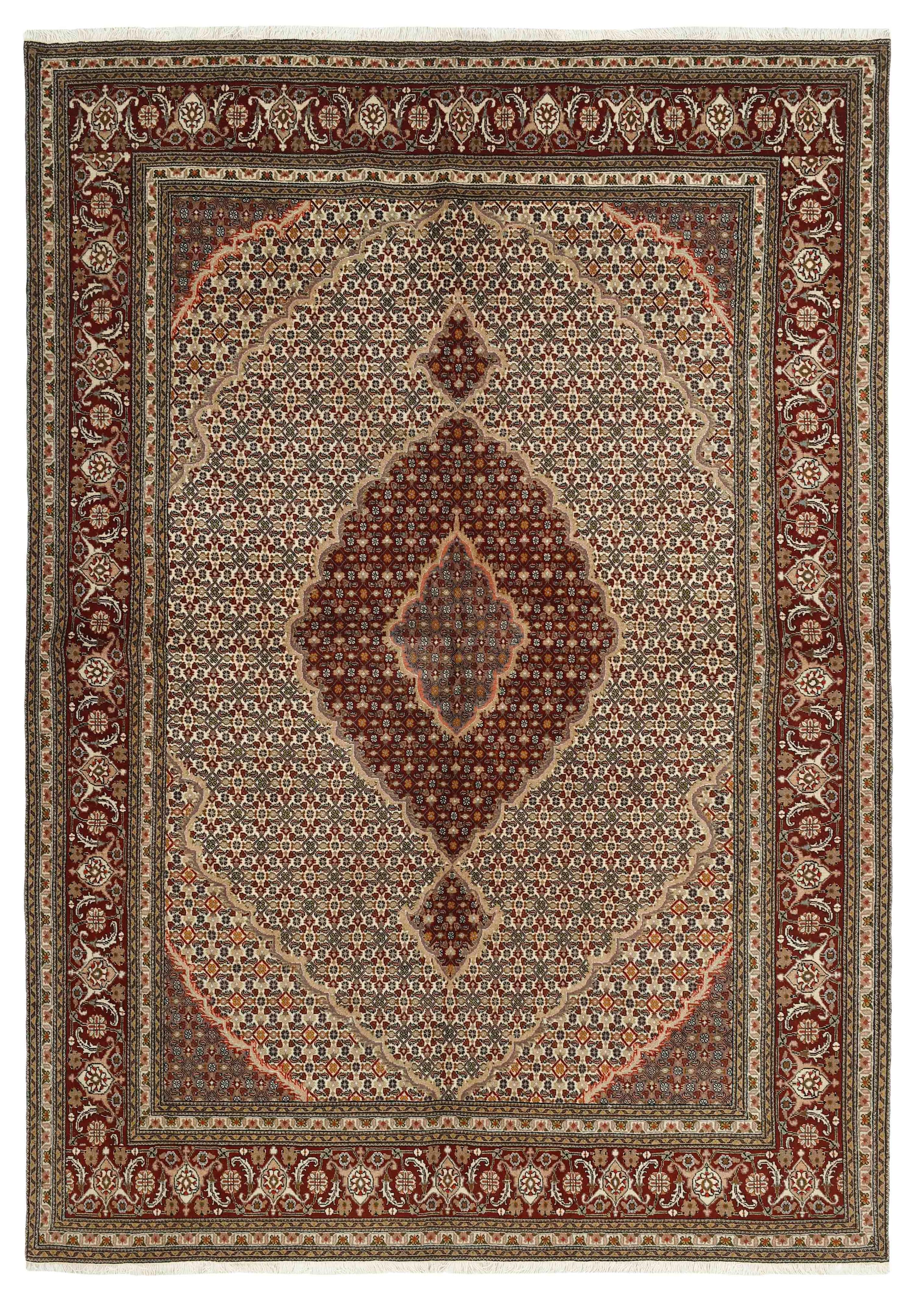 Authentic persian rug with traditional floral design in red, black and beige