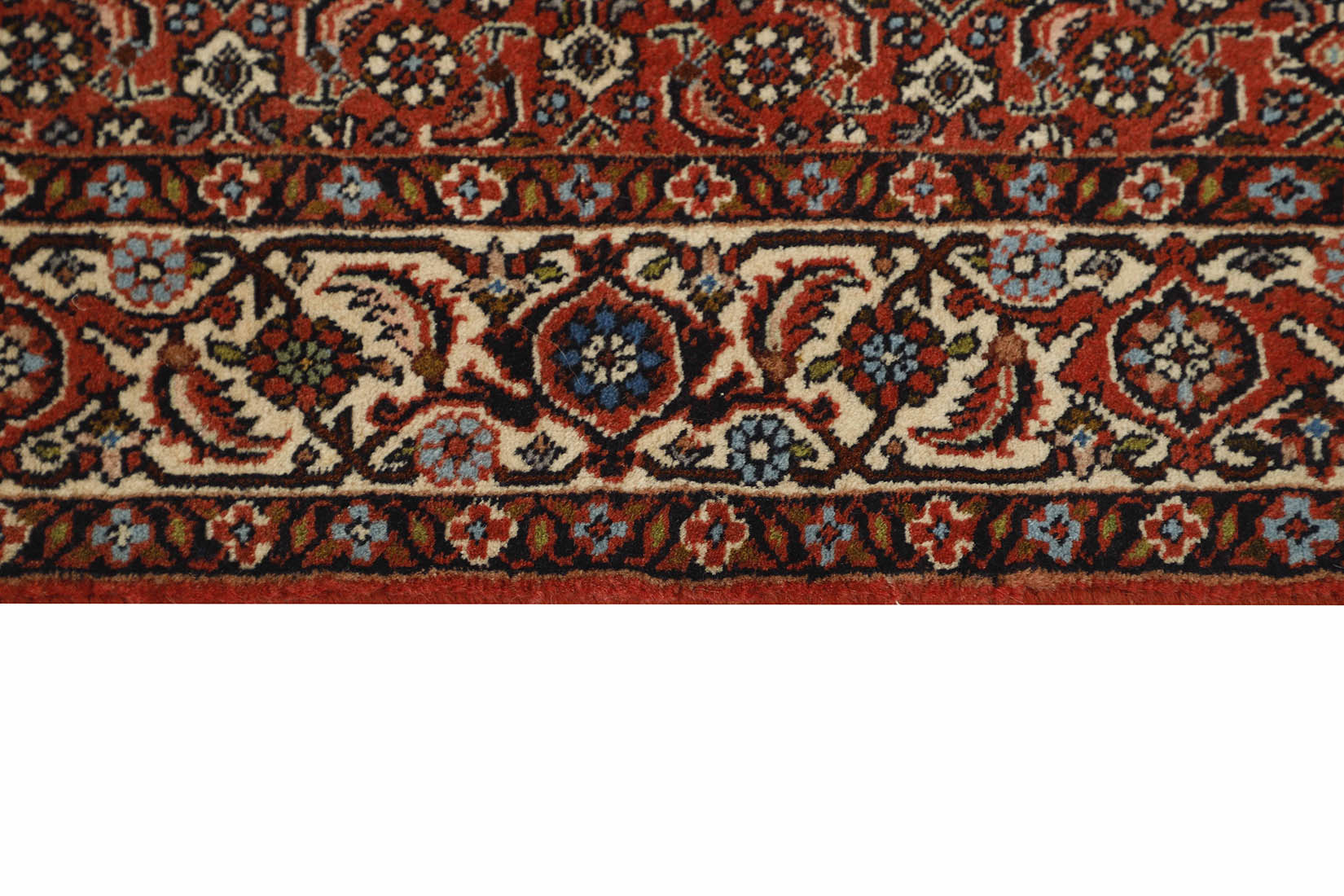 Red and cream persian runner with traditional floral design
