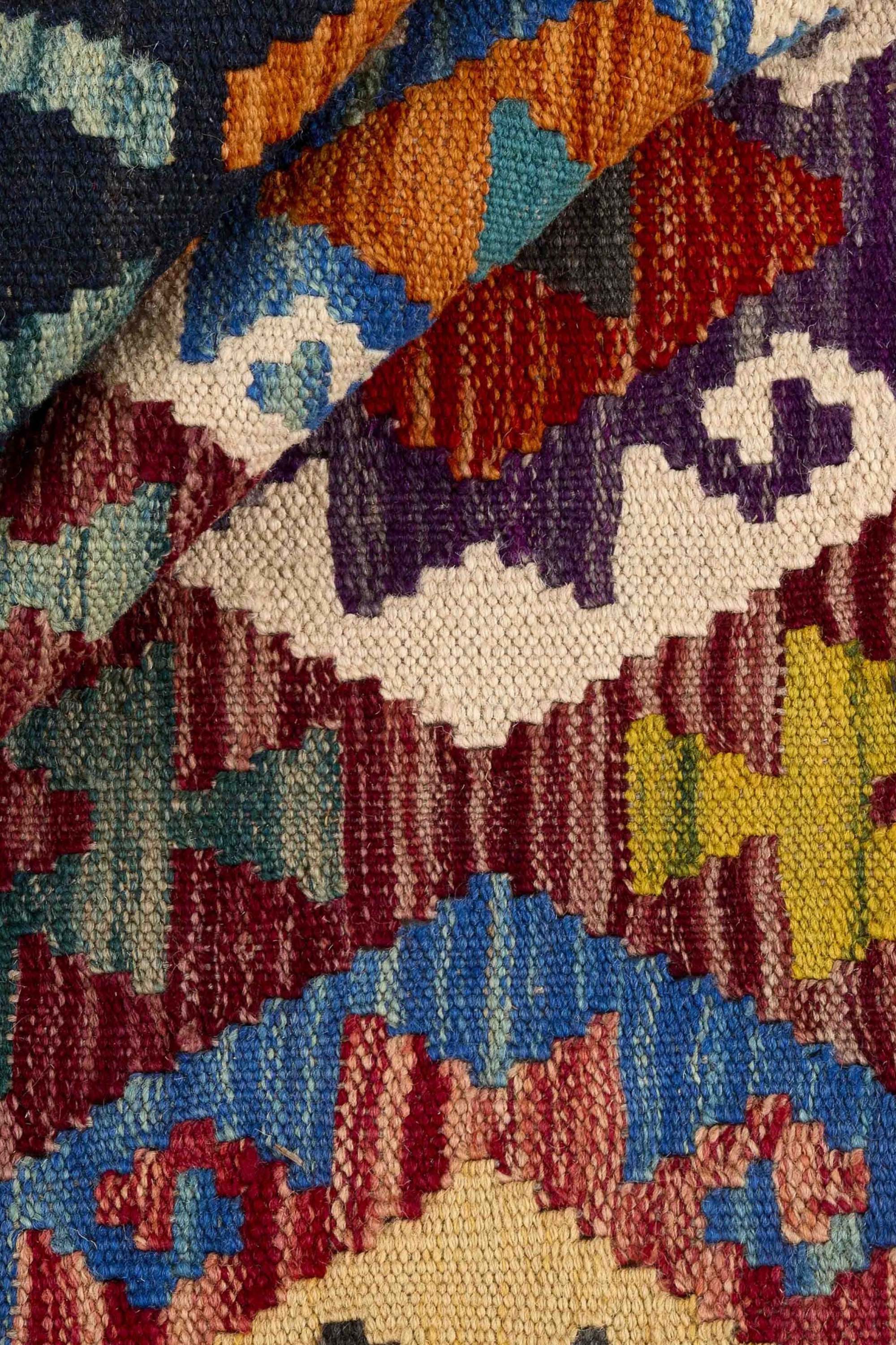 Authentic Persian Kilim flatweave rug with traditional multicolour pattern