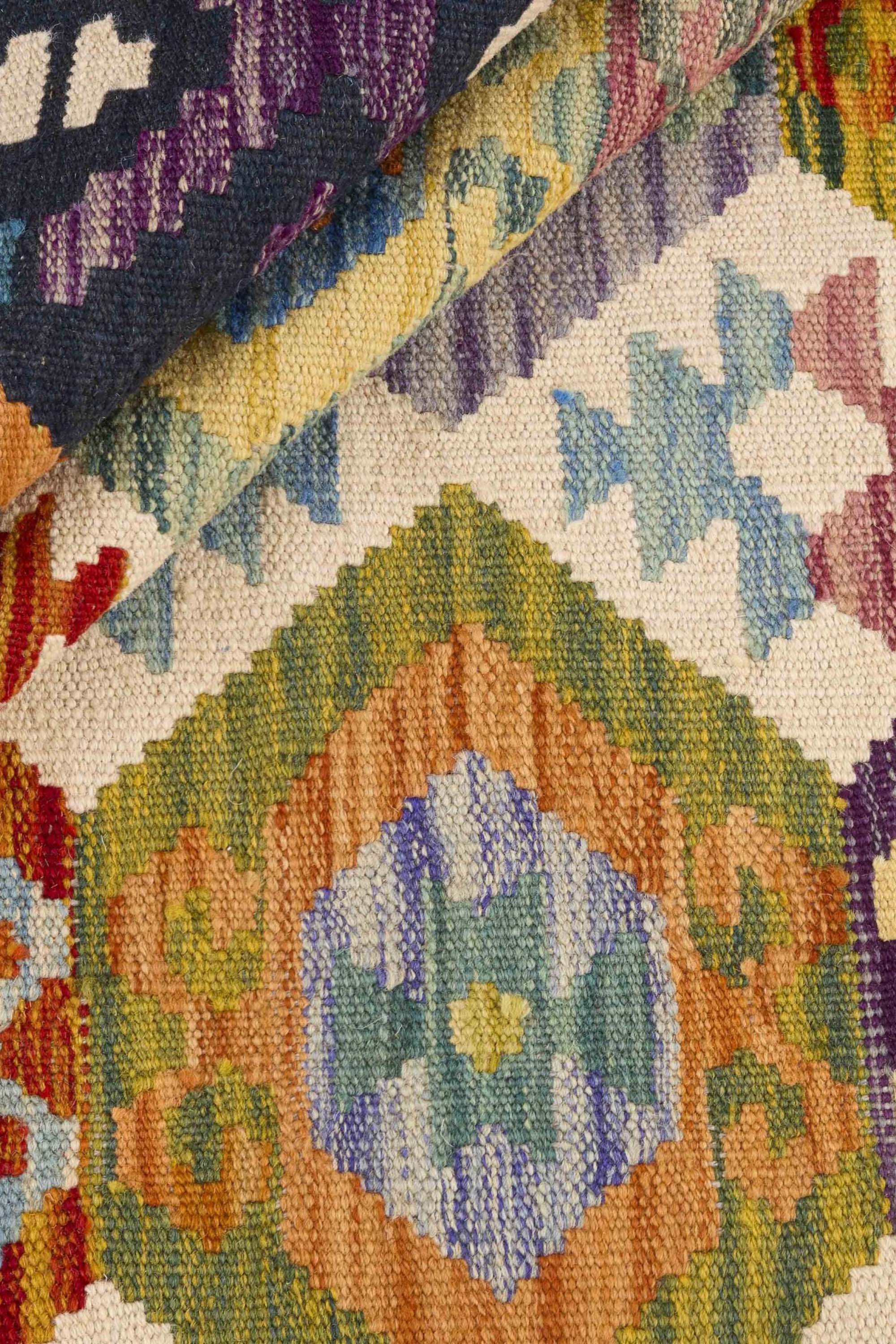 Authentic Persian Kilim flatweave rug with traditional multicolour pattern