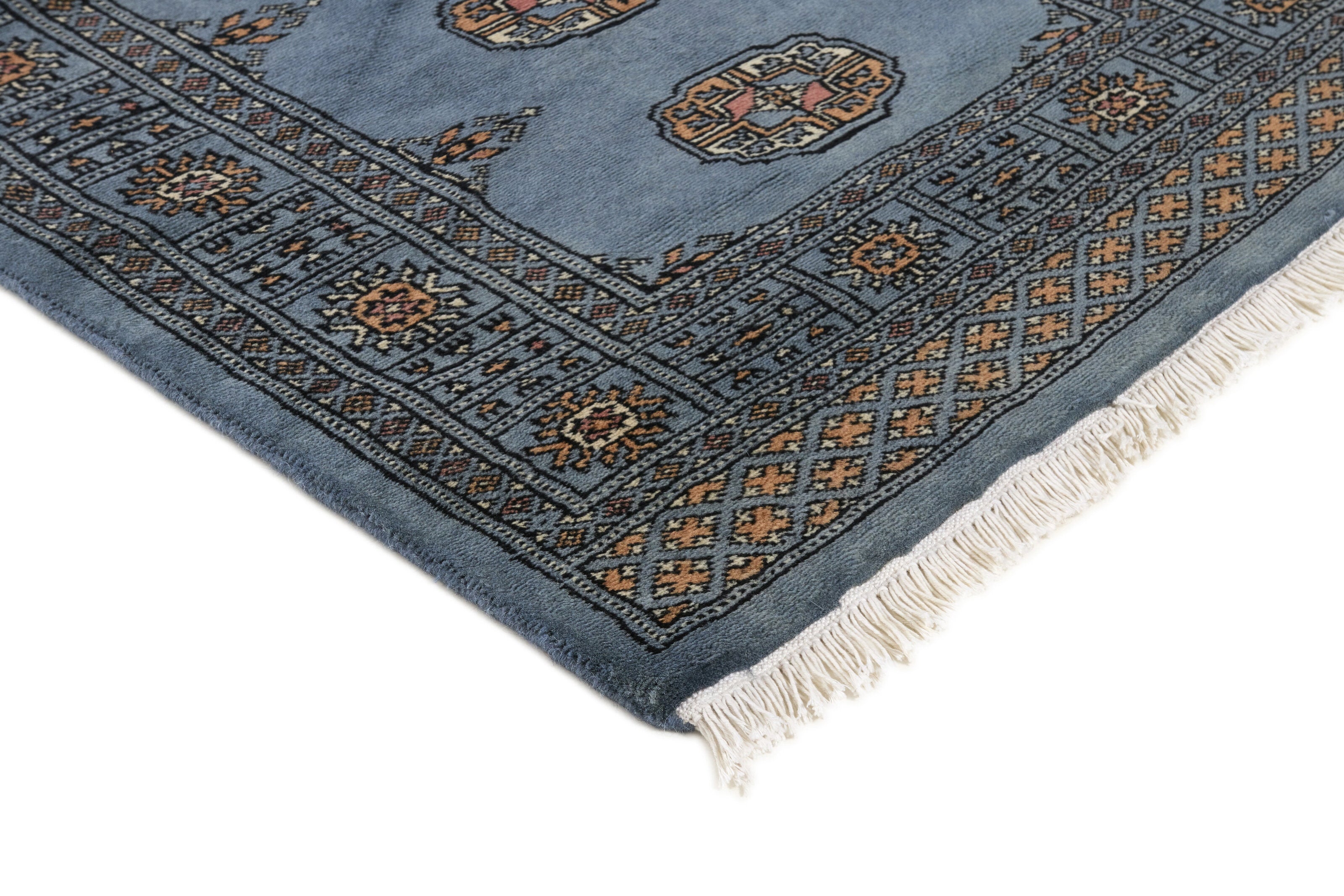 Blue Oriental runner with traditional bordered pattern