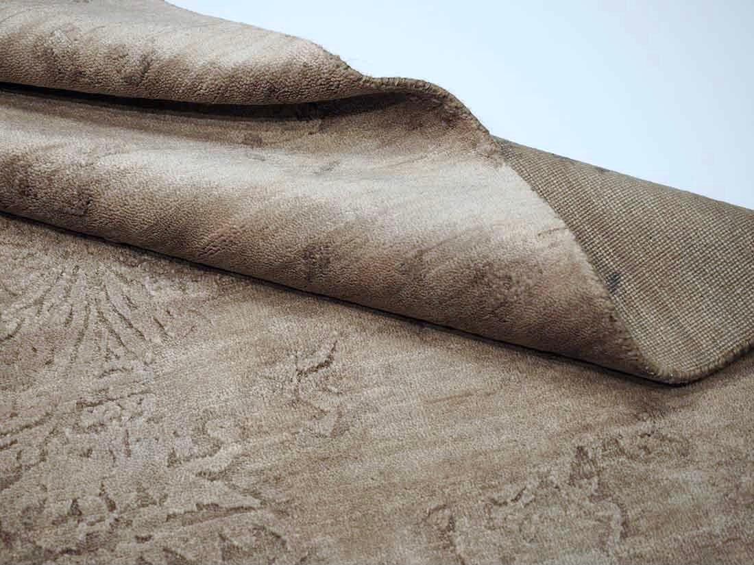 Authentic oriental rug with a damask pattern in beige