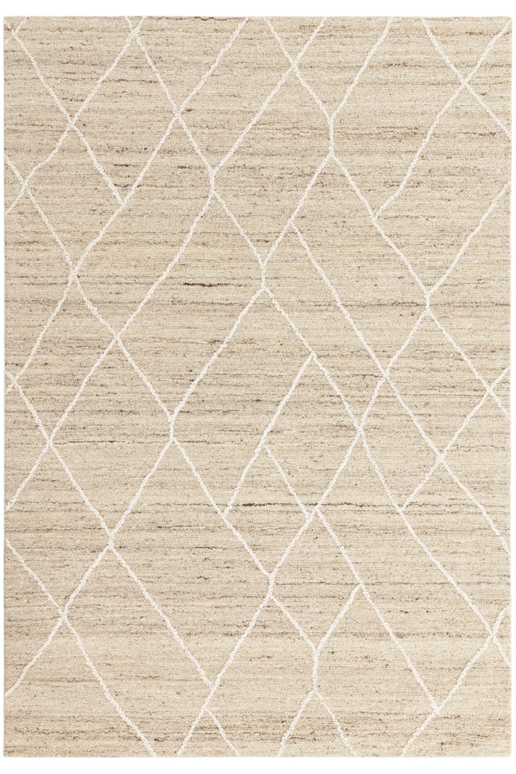 Light brown wool rug with geometric pattern and heathered texture