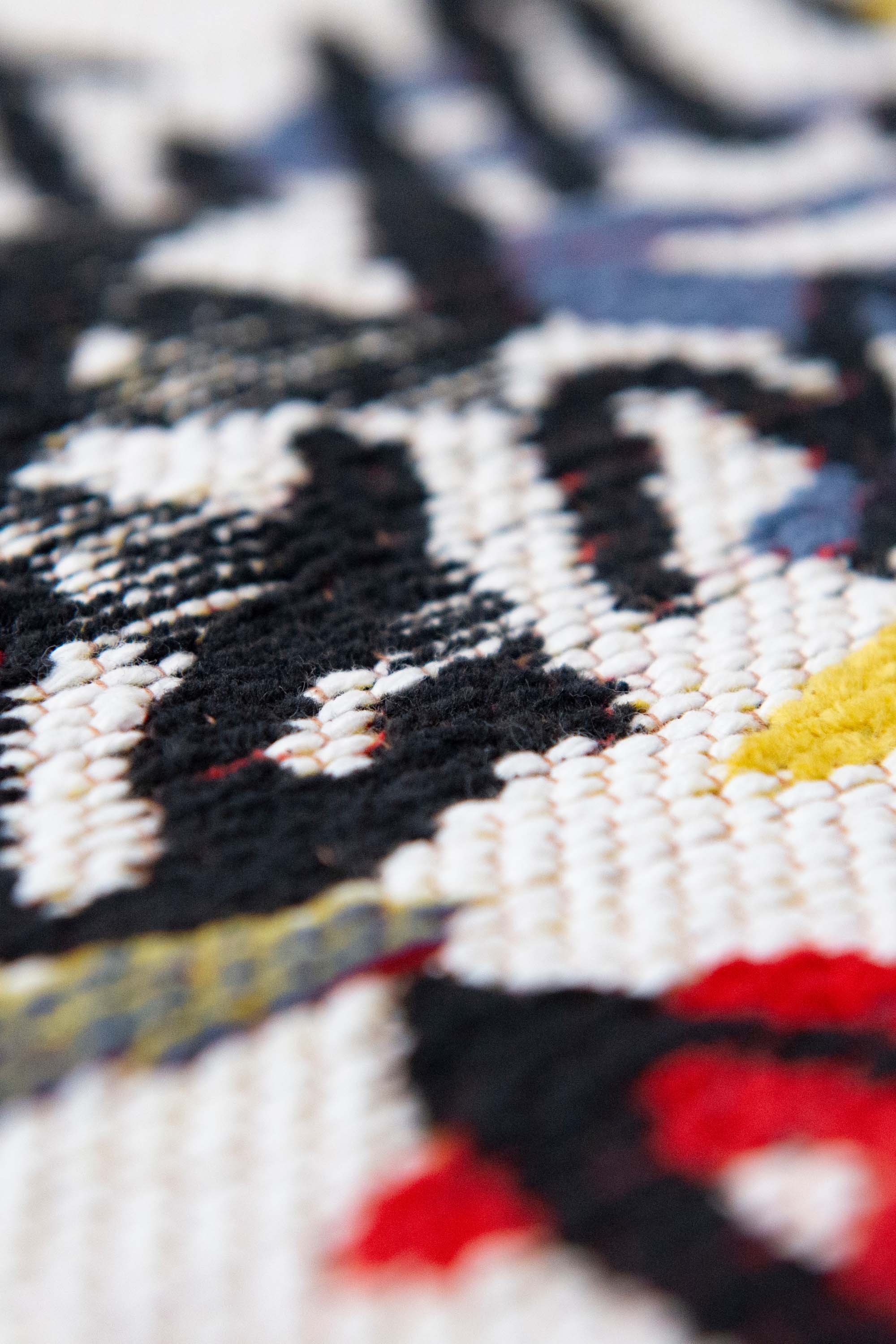 multicolour abstract rug with a squiggle design