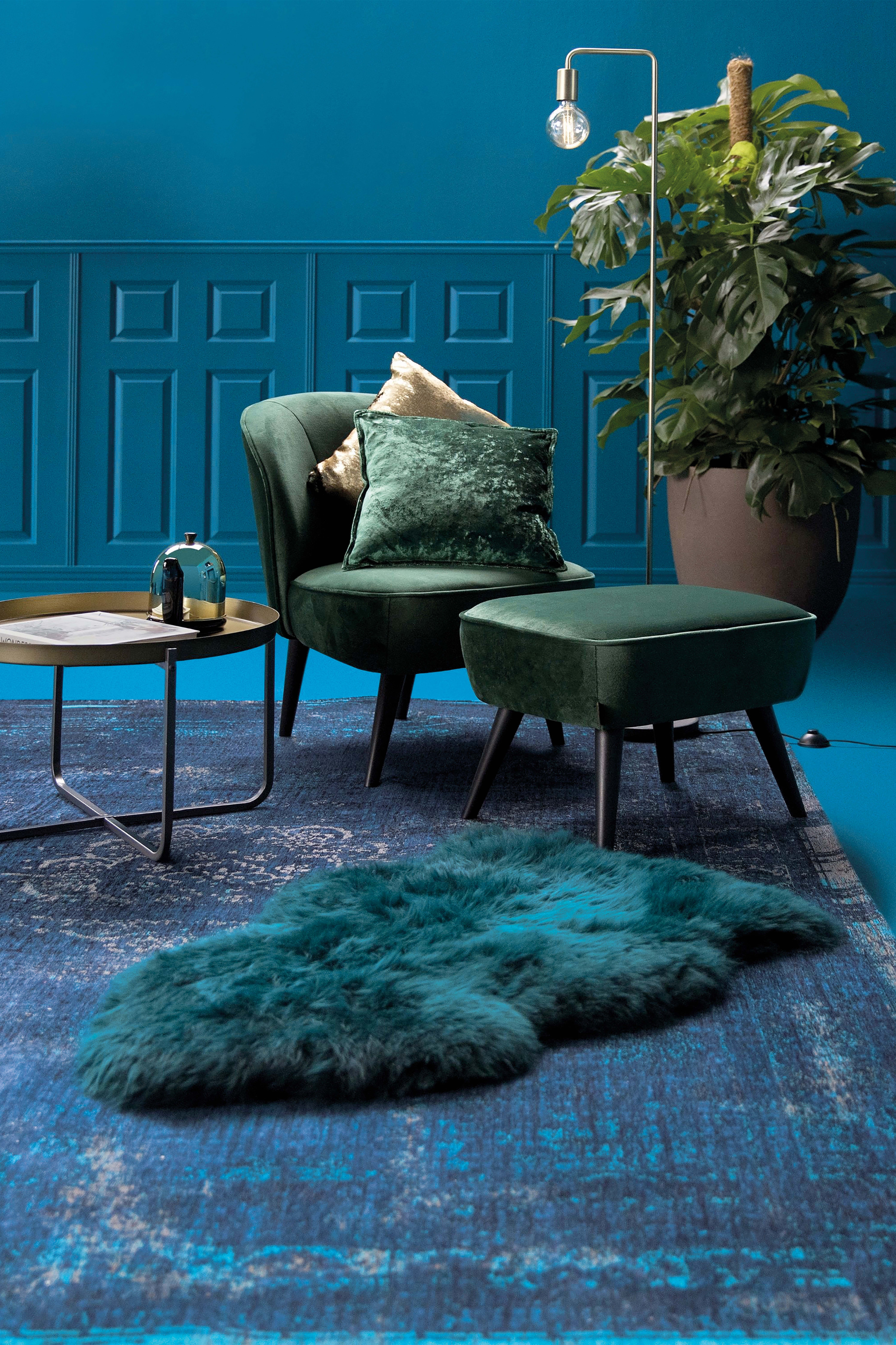 Blue flatweave rug with faded persian design