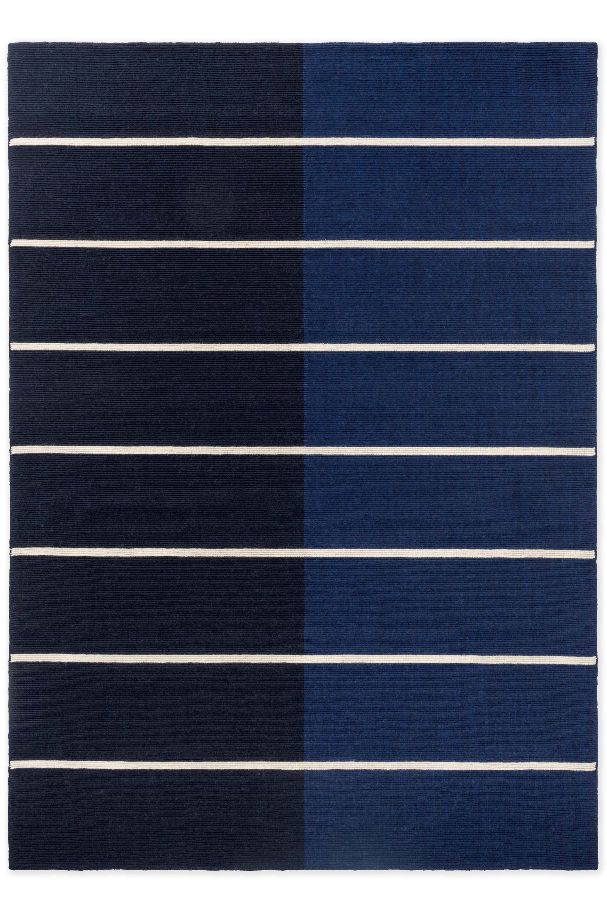 Geometric rug with blue linear pattern