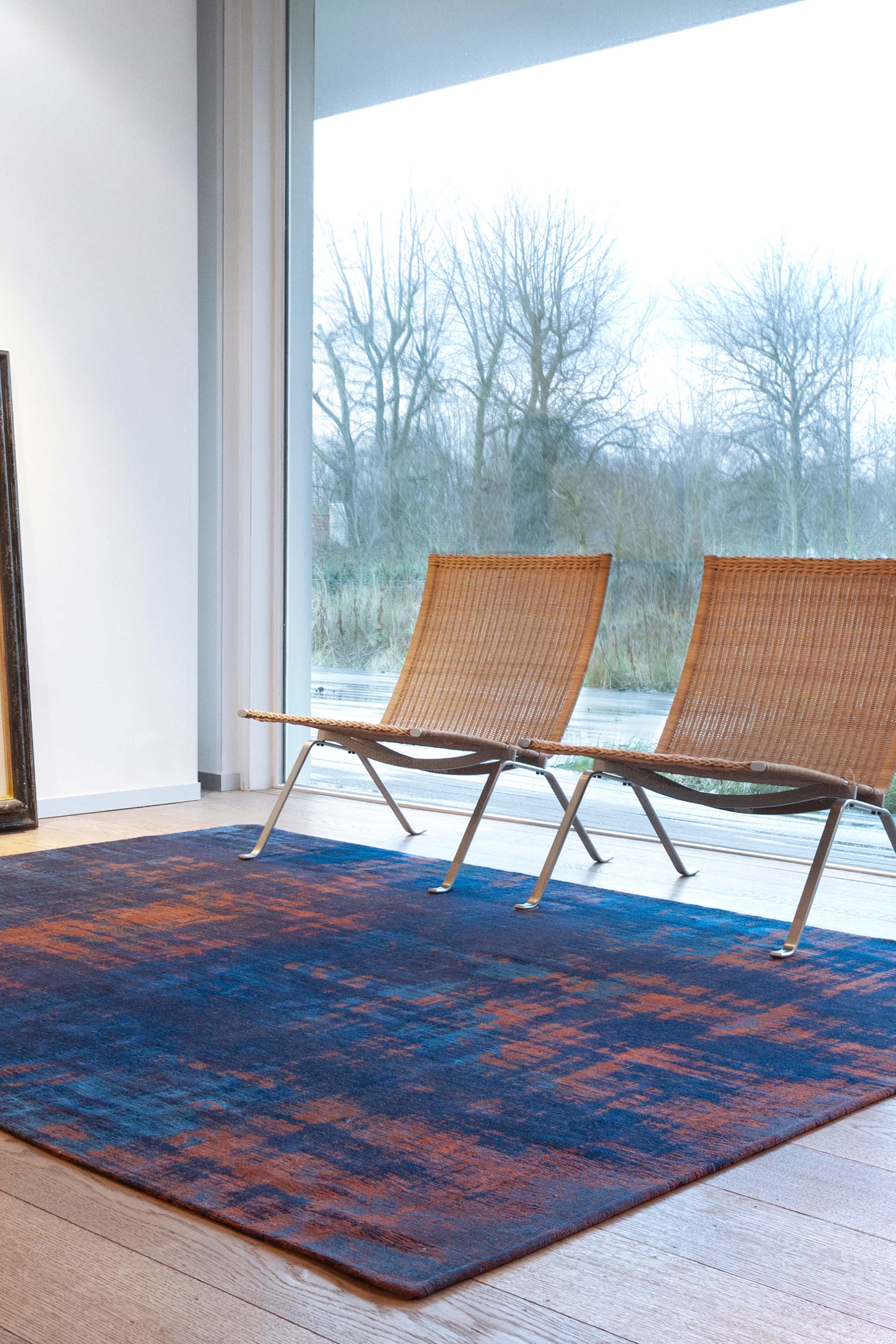 navy blue flatweave rug with modern abstract design