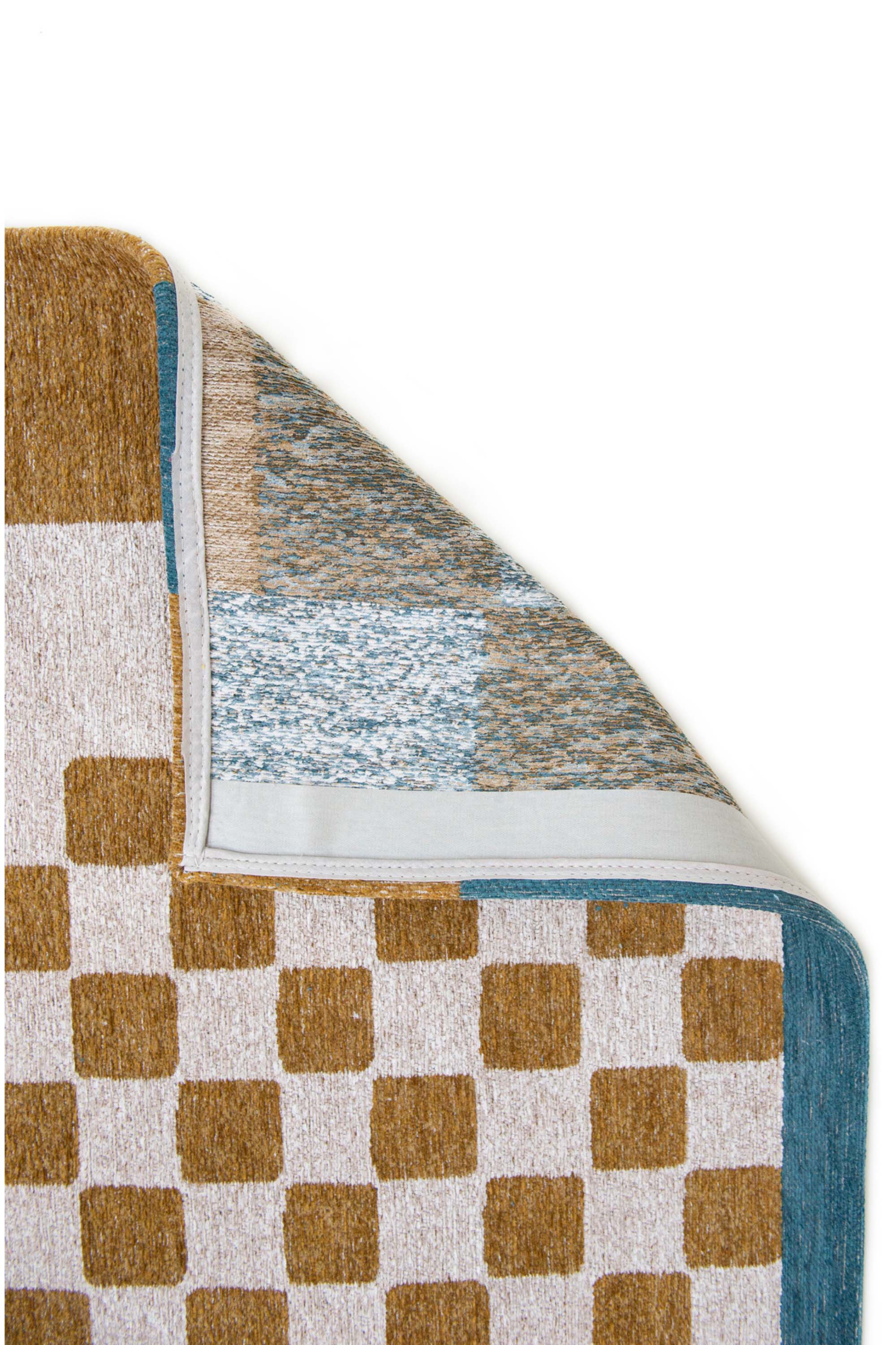 Abstract geometric rug with yellow, green, and white tones