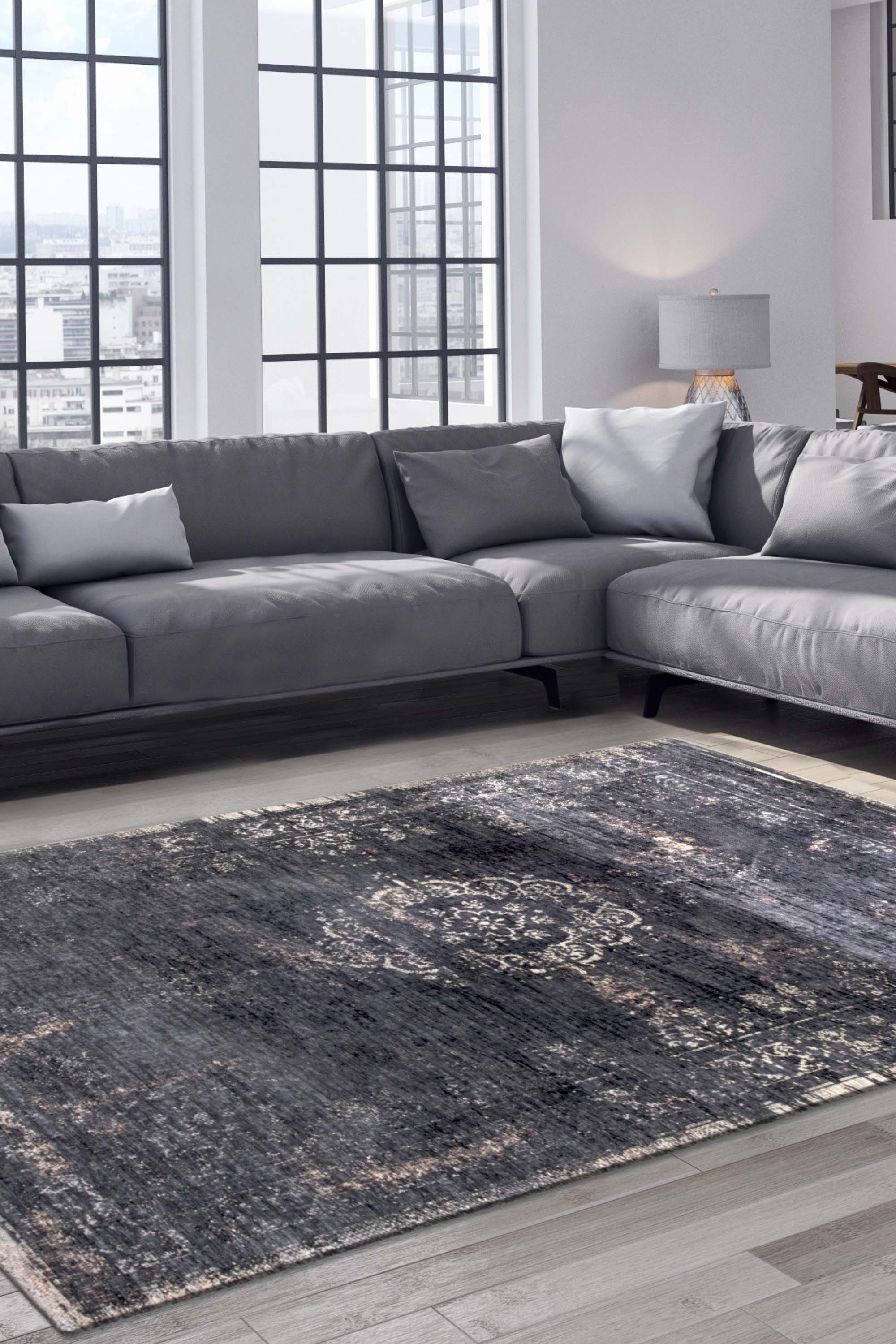 Black flatweave rug with faded persian design