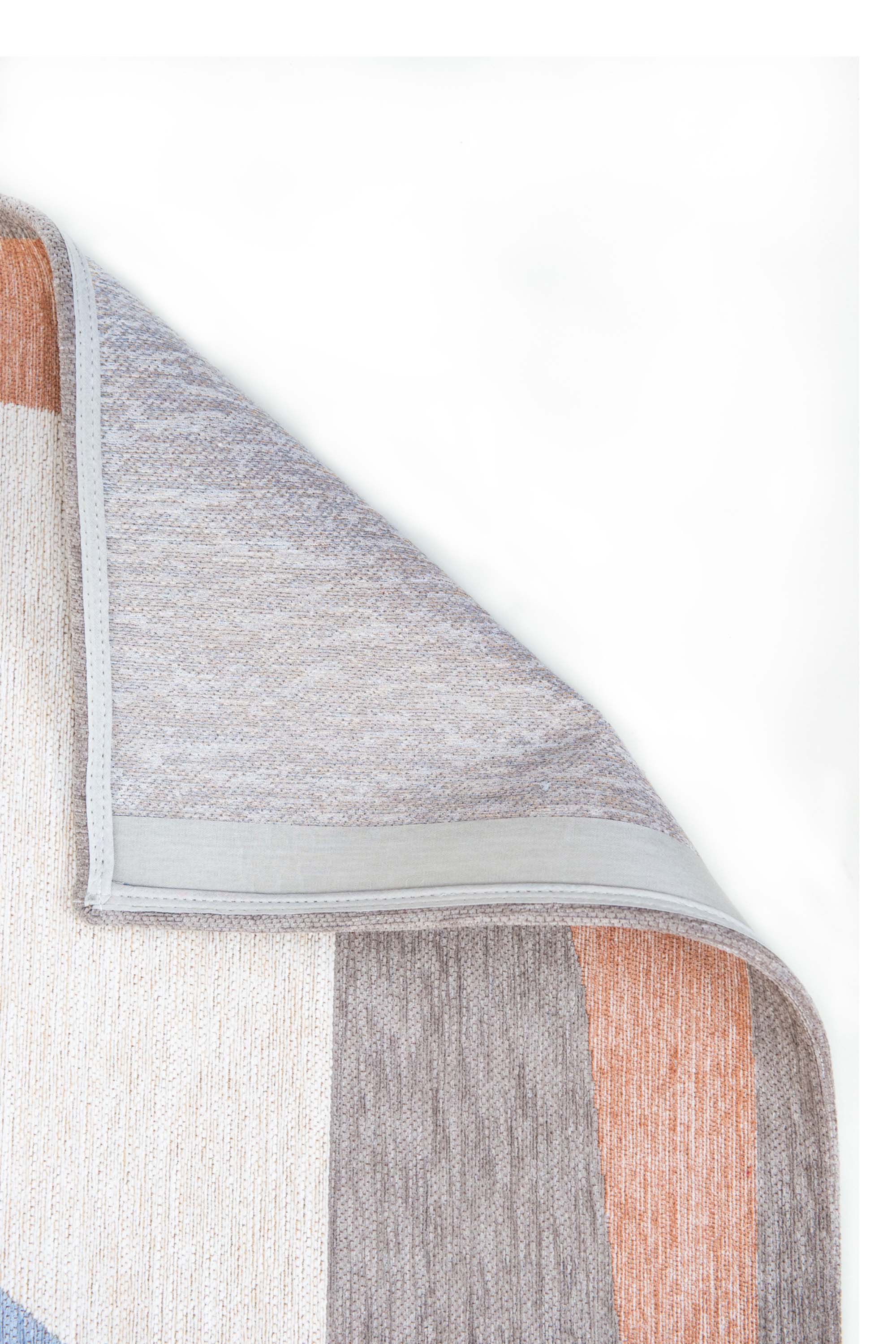 Modern rug with red, blue, white, and grey abstract pattern