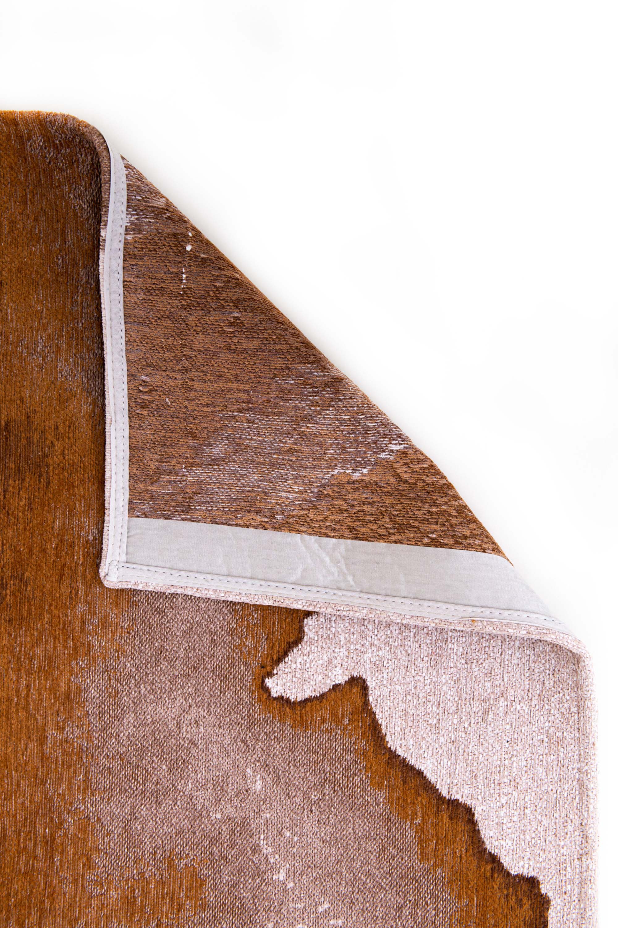 Modern rug with brown abstract shoreline pattern