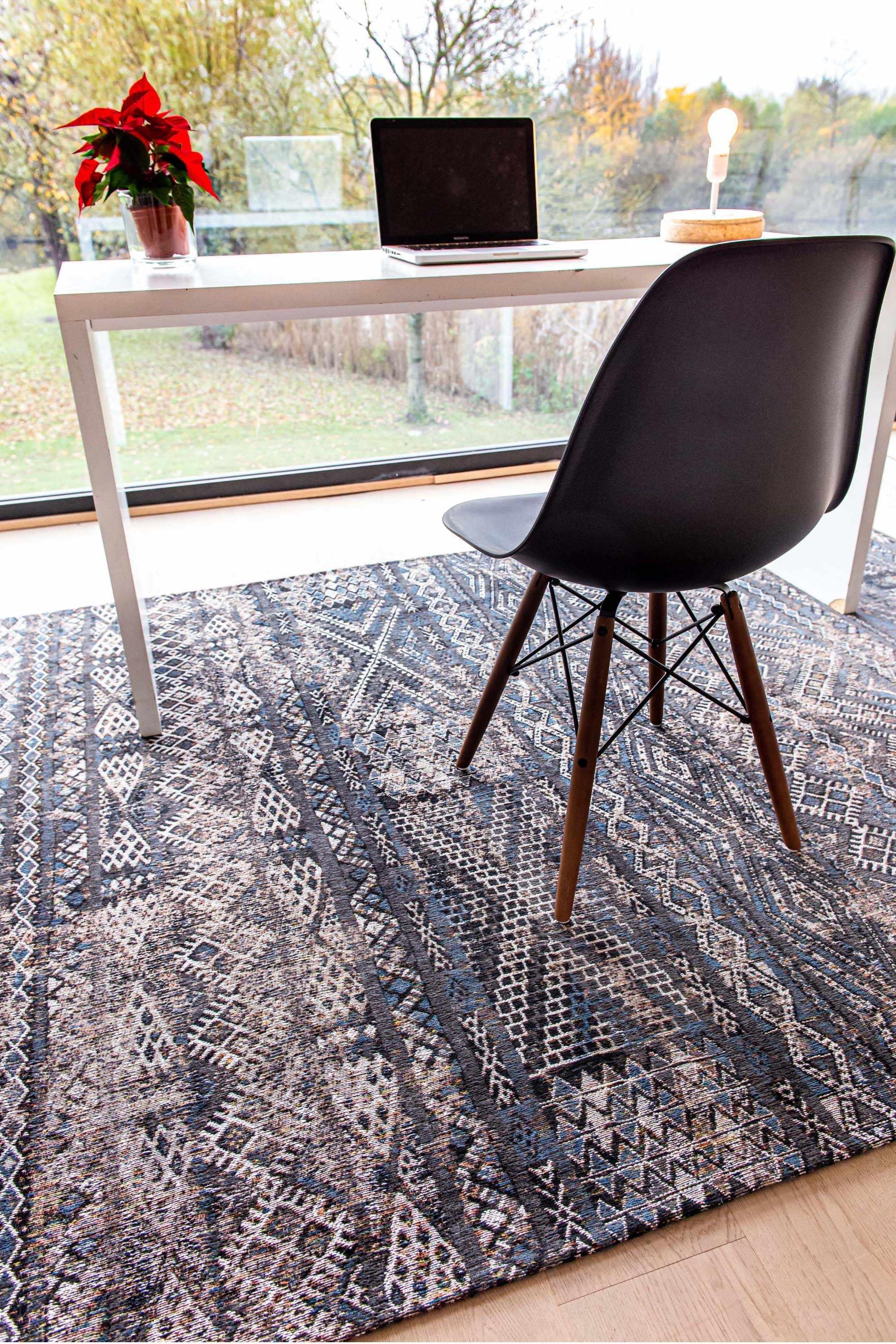 brown rug with a moroccan geometric pattern