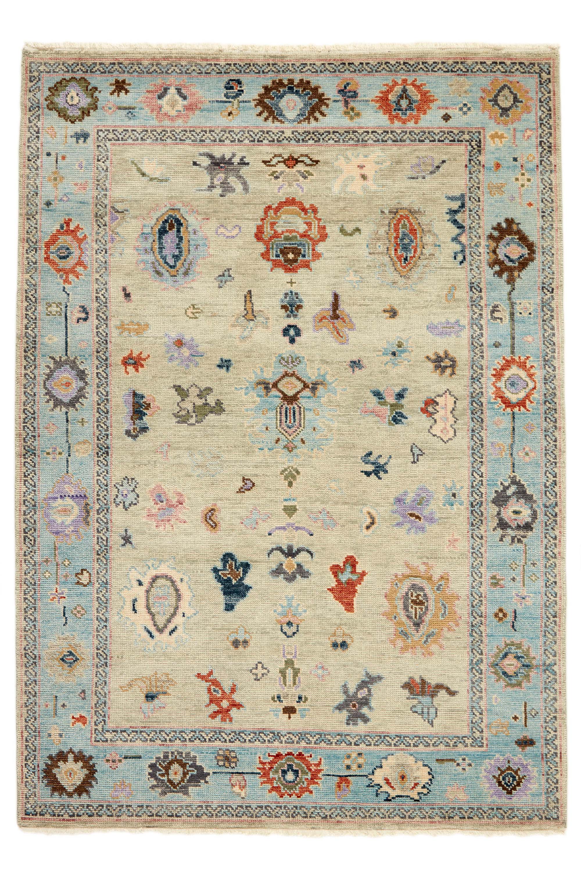 Traditional multicoloured Oushak rug with blue border