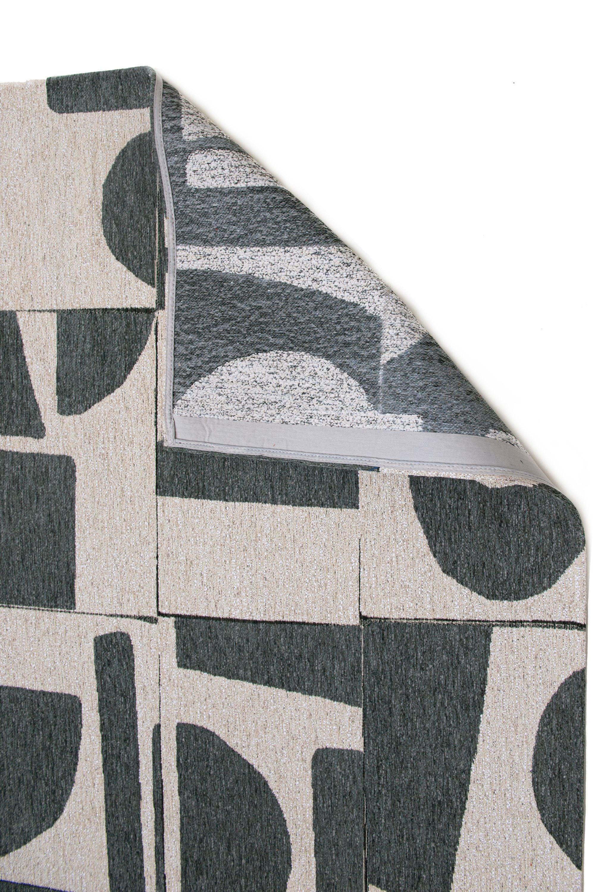 Modern abstract runner rug with green patchwork pattern