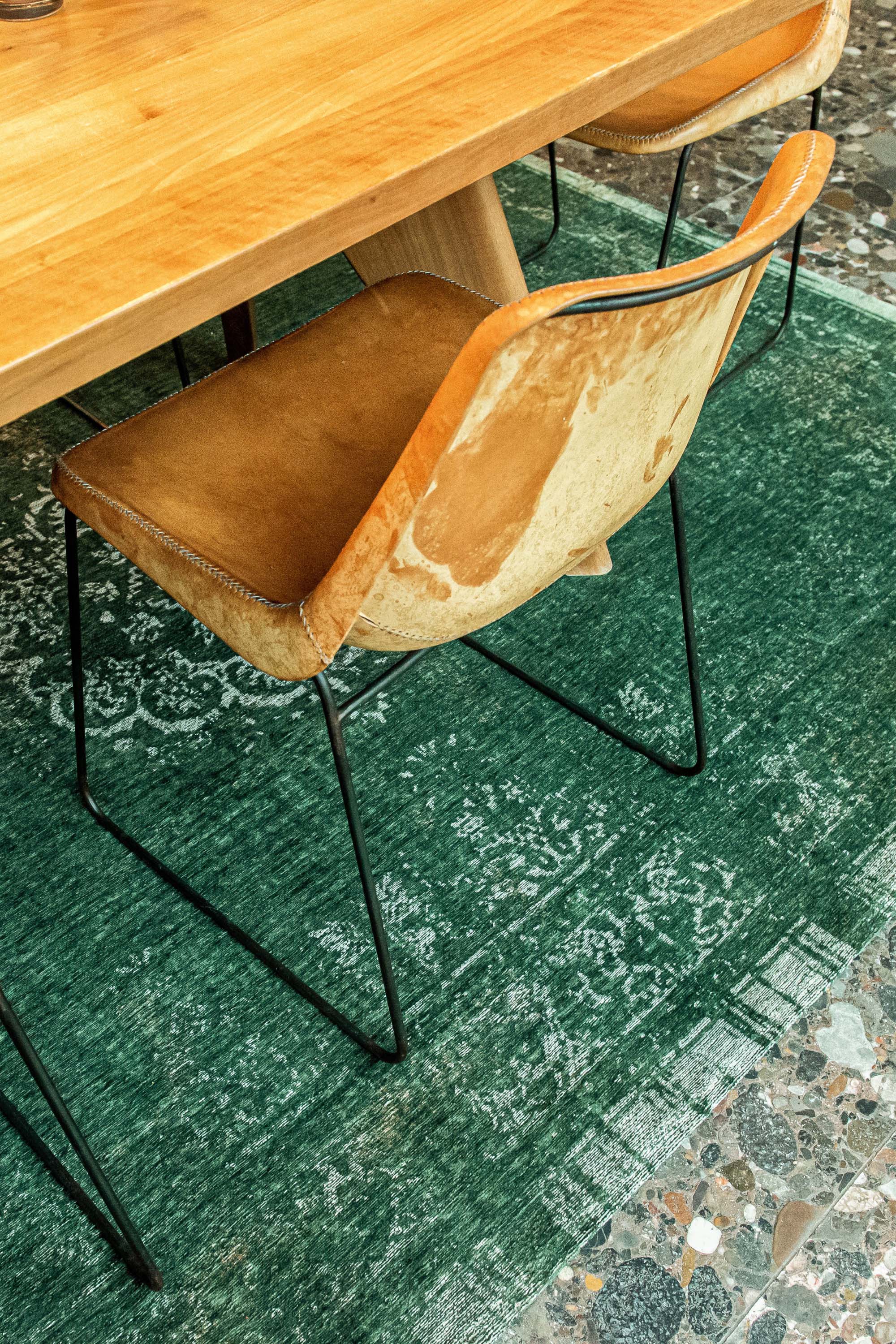 green vintage style rug