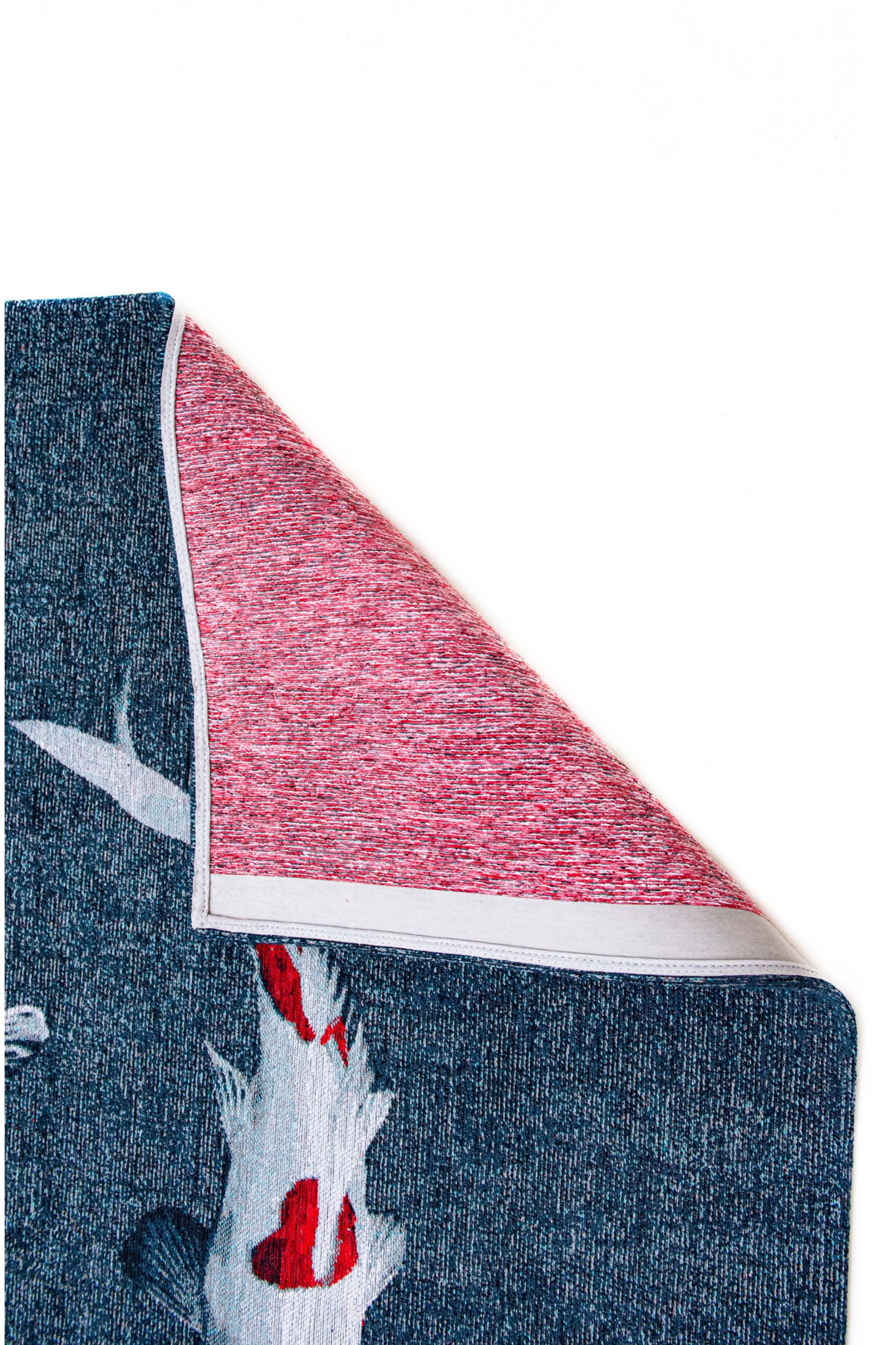 Modern navy rug with detailed koi fish print