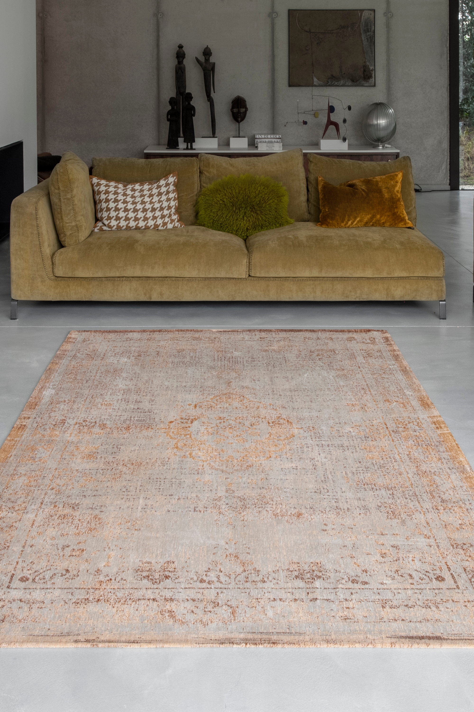faded orange flatweave rug with traditional medallion design