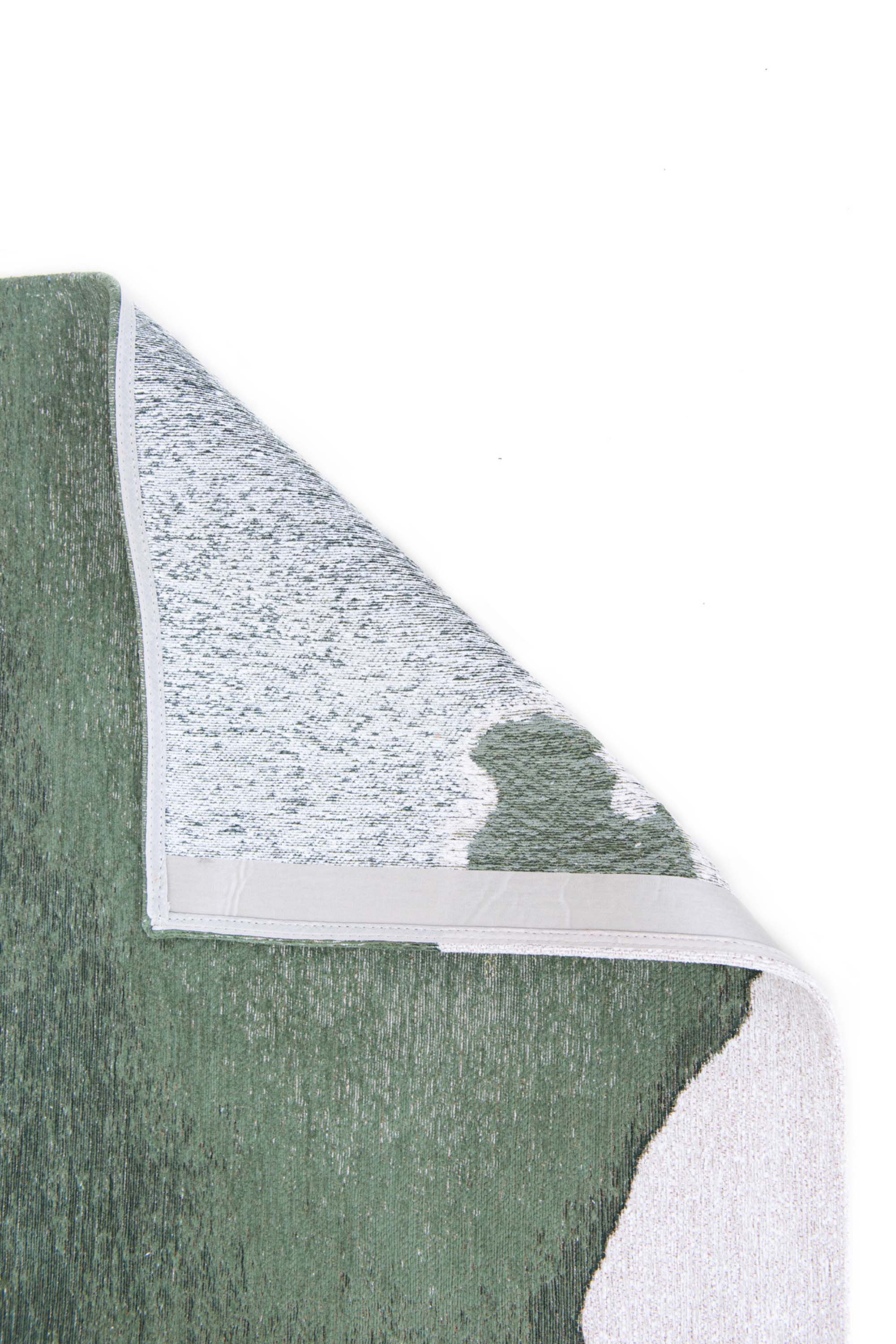 Modern rug with green abstract shoreline pattern