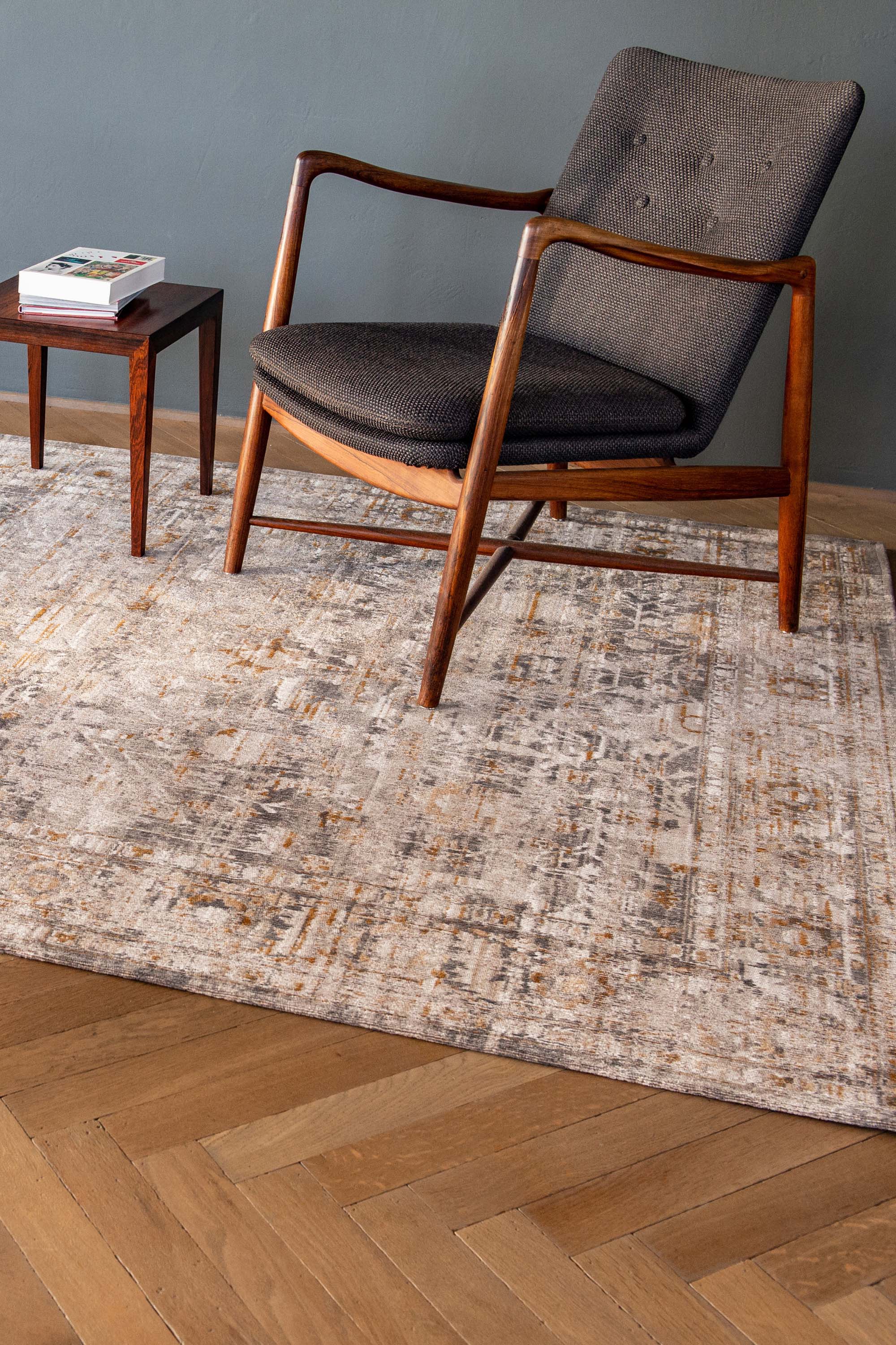 Distressed beige rug with turkish floral medallions and border in gold and grey