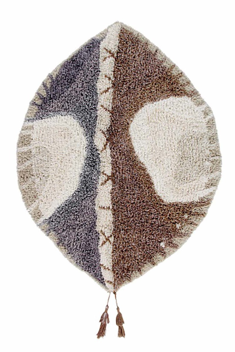 brown and grey oval shaped rug with tribal design
