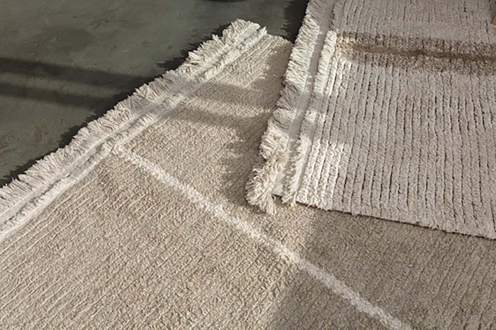 reversible textured rug in beige and sage