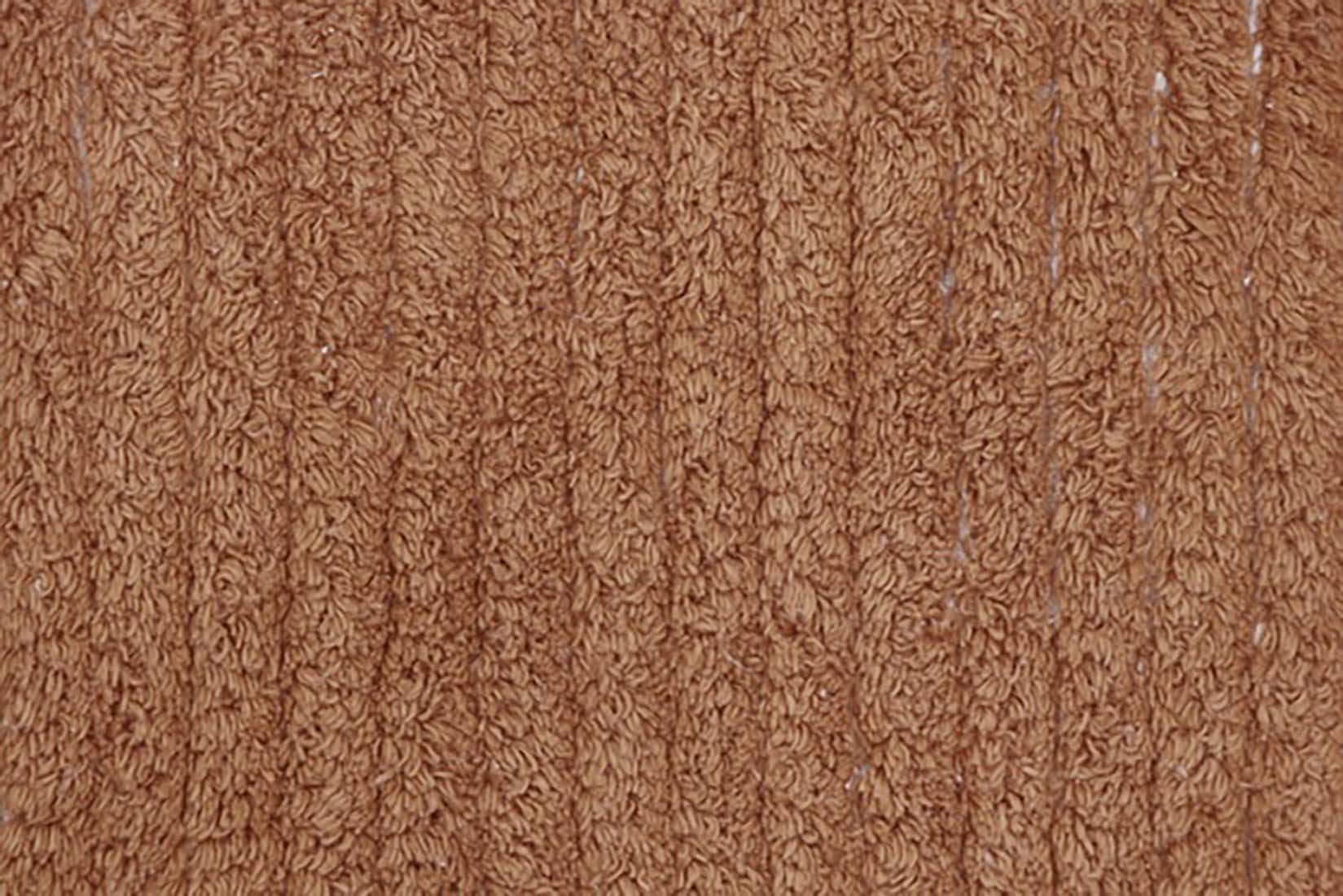 reversible textured rug in beige and brown