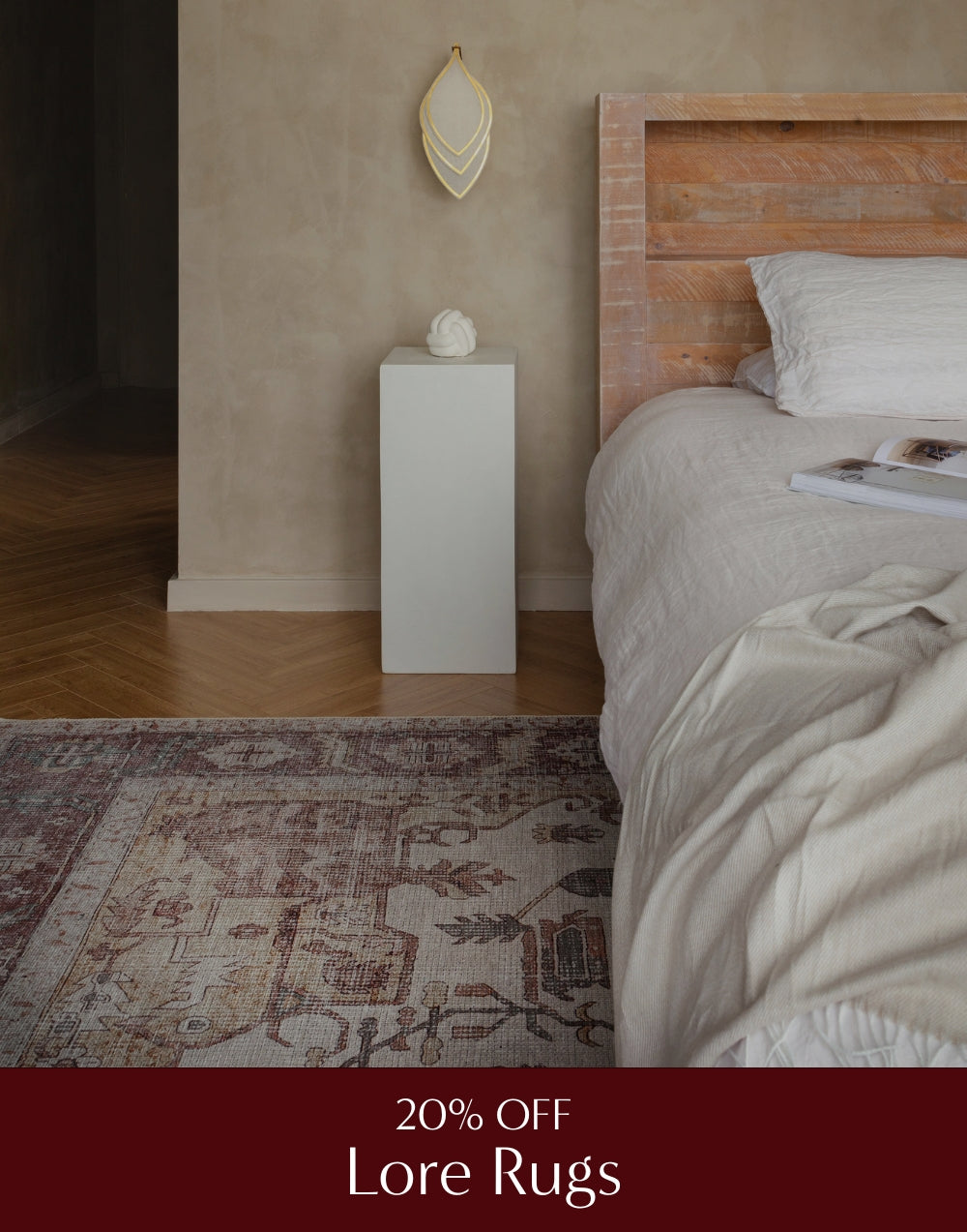 Bedroom with a bed, nightstand, and rug, featuring a promotional message for Lore Rugs.