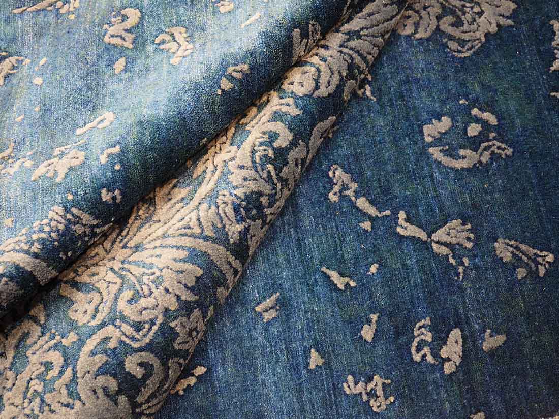 Authentic oriental rug with a damask pattern in beige