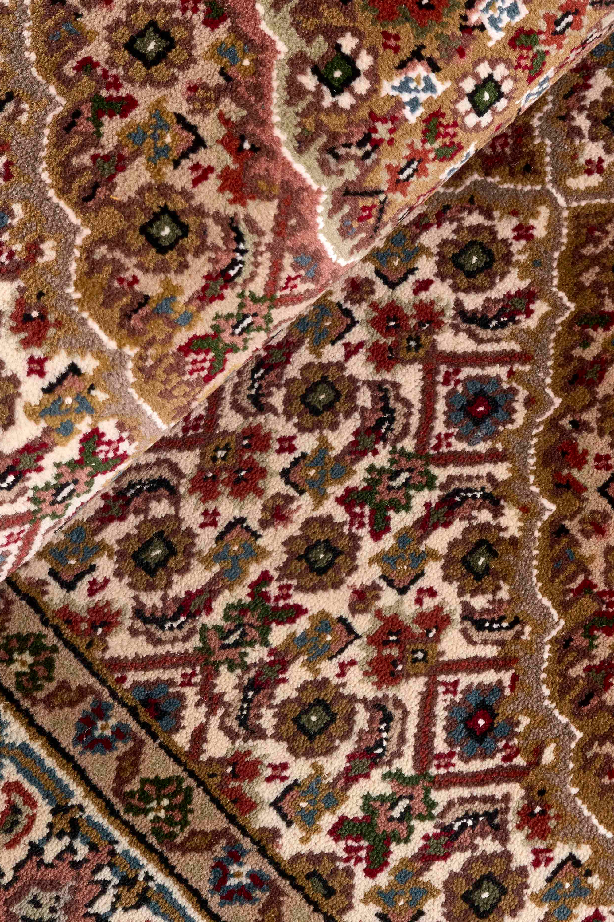 Traditional bordered Tabriz Indi runner