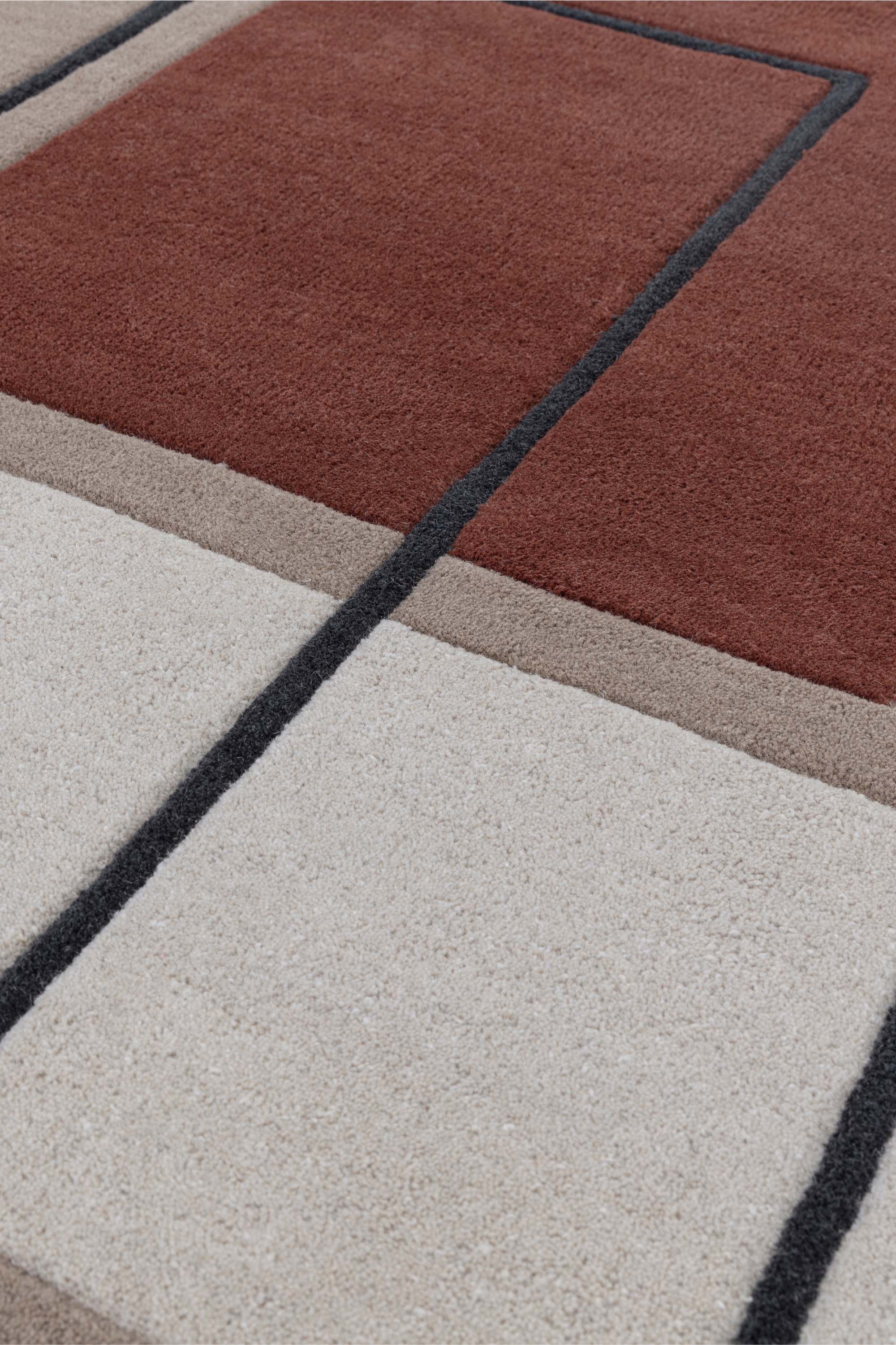 Geometric wool rug featuring a minimal pattern
