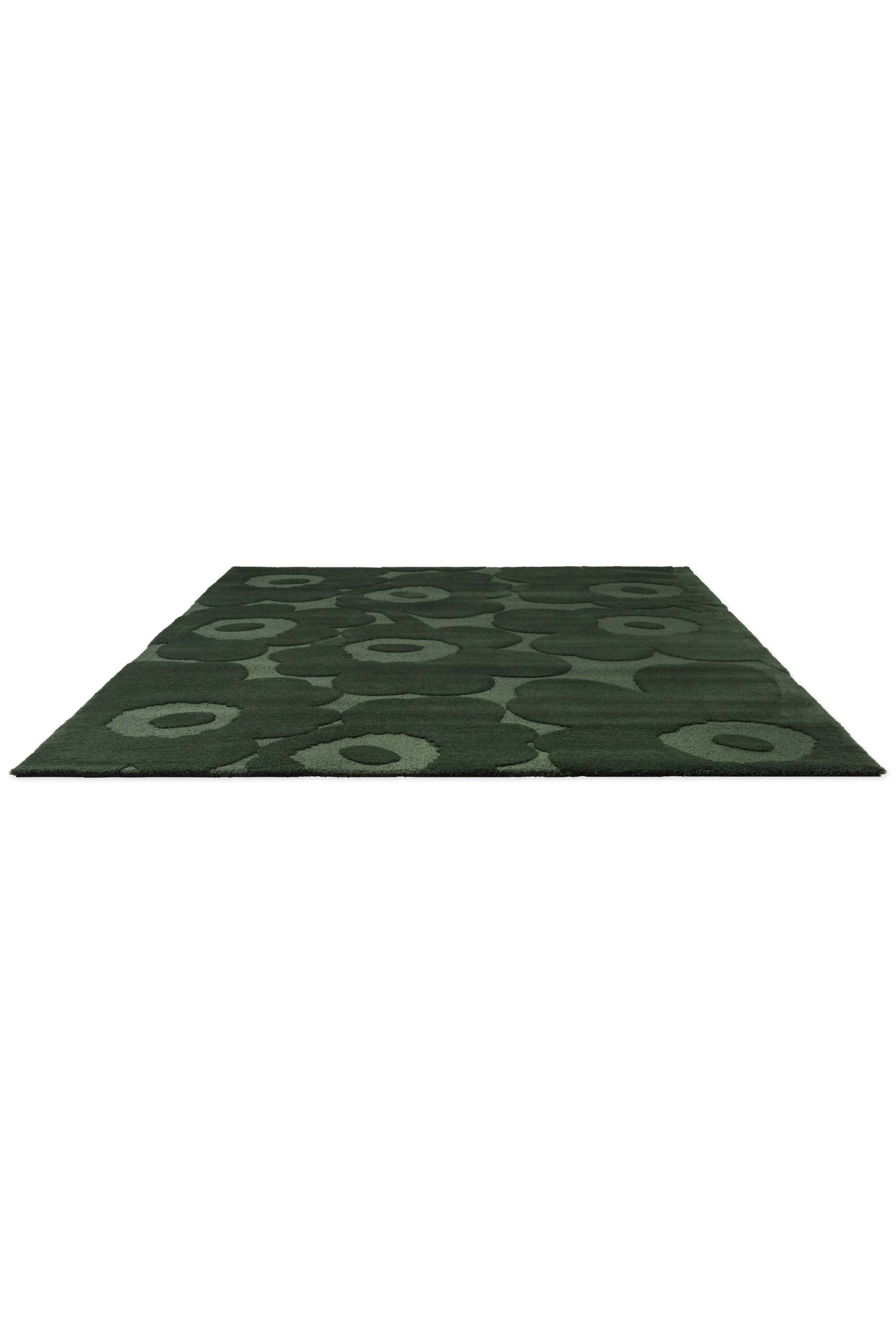 Dark green patterned floral rug 