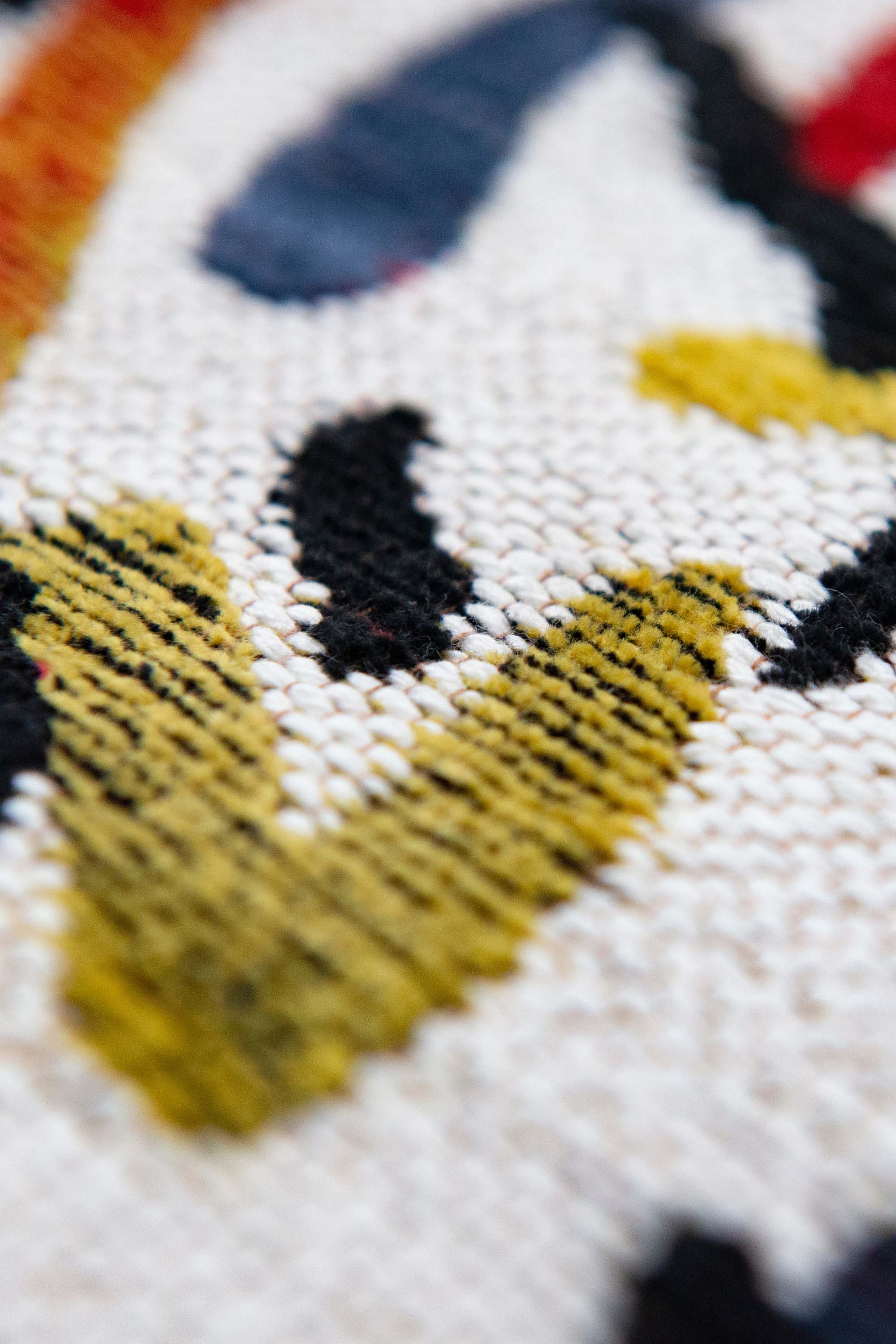 multicolour abstract rug with a squiggle design