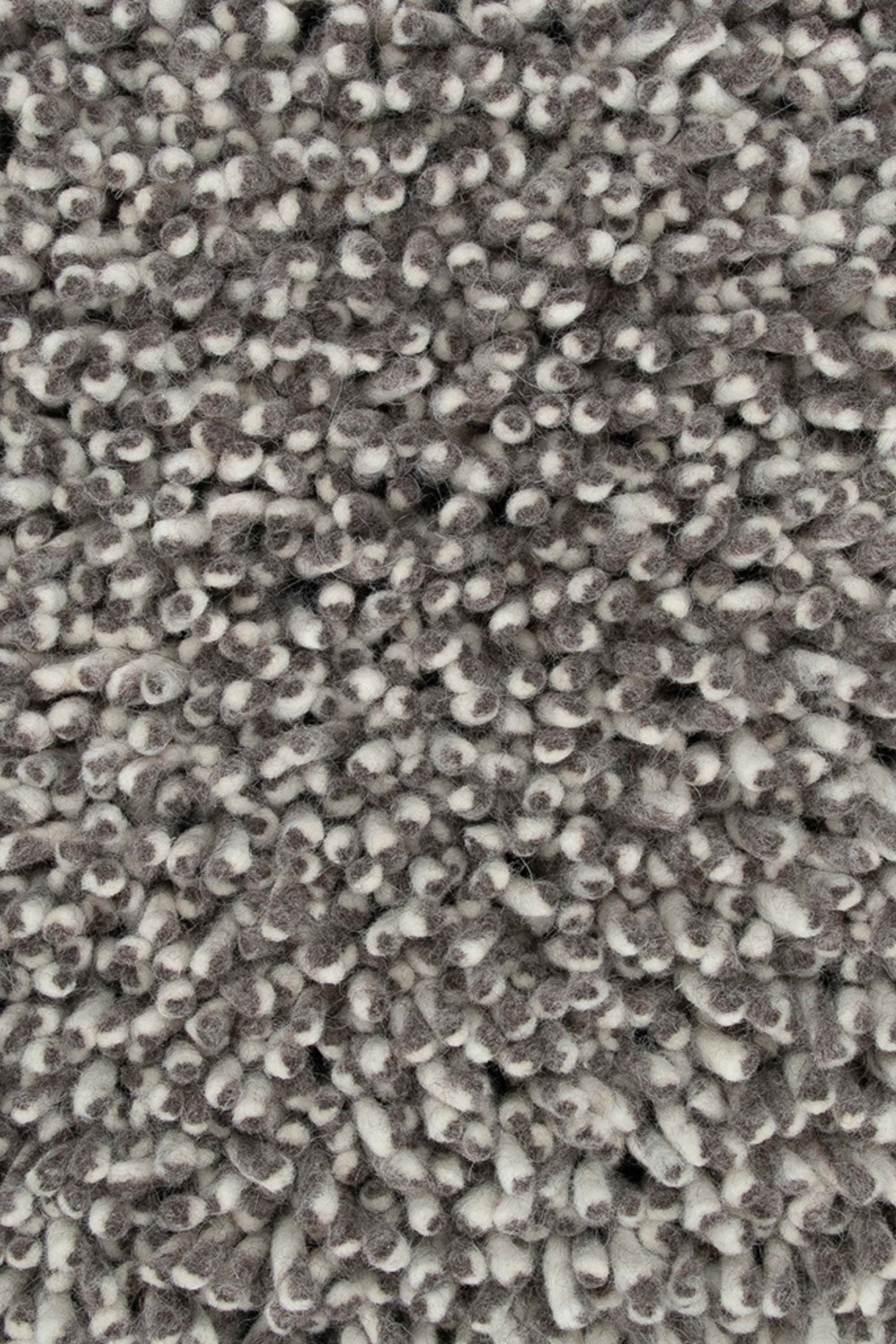 Plain dark grey rug with shaggy pile