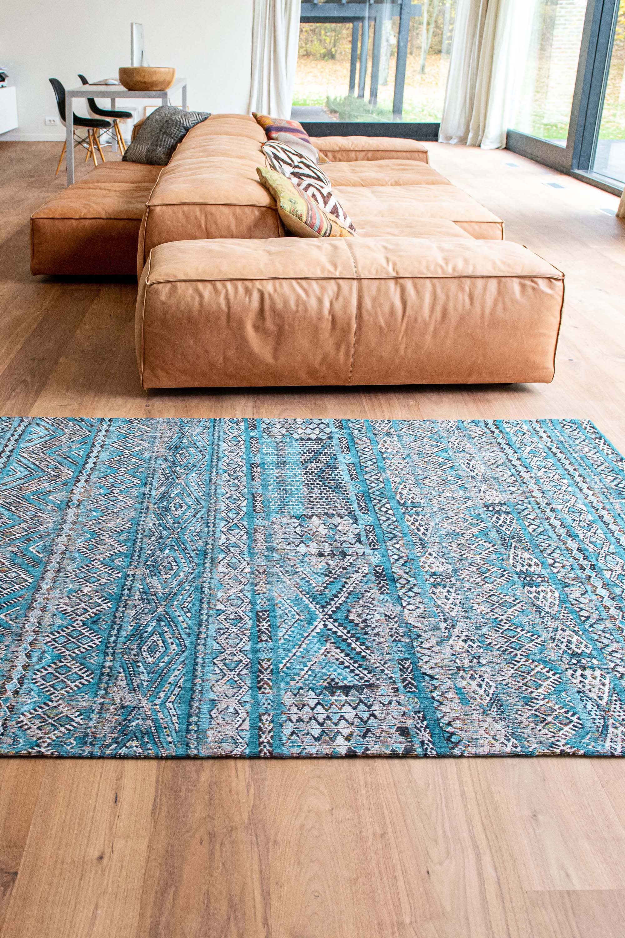 blue rug with a moroccan geometric pattern