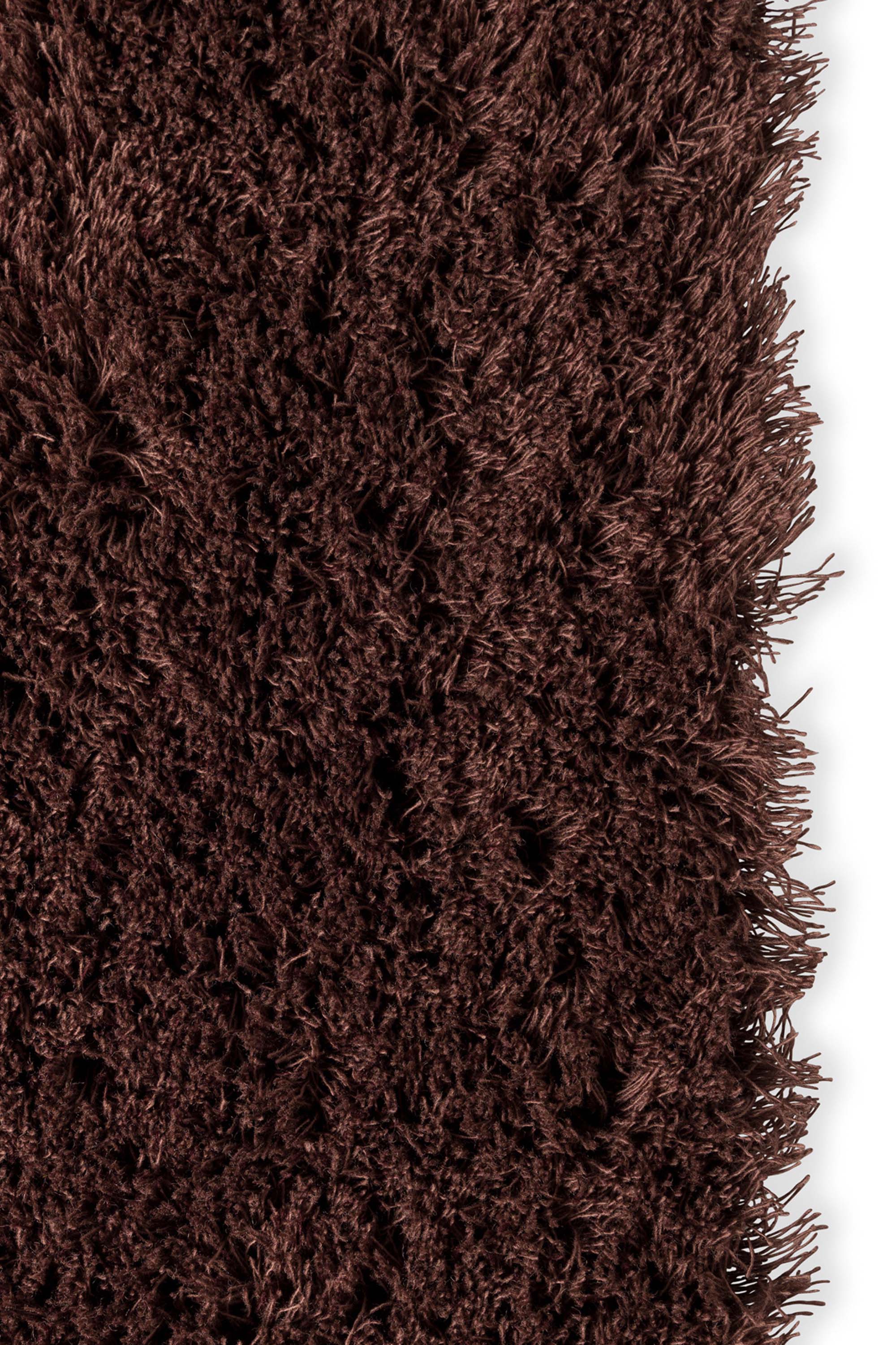 Plain red rug with shaggy pile