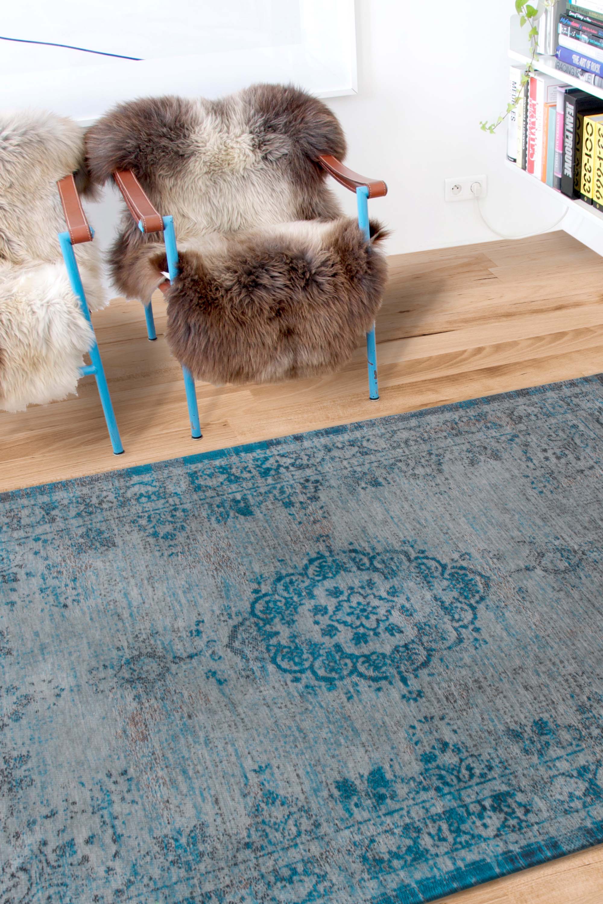 Grey and blue flatweave rug with faded persian design