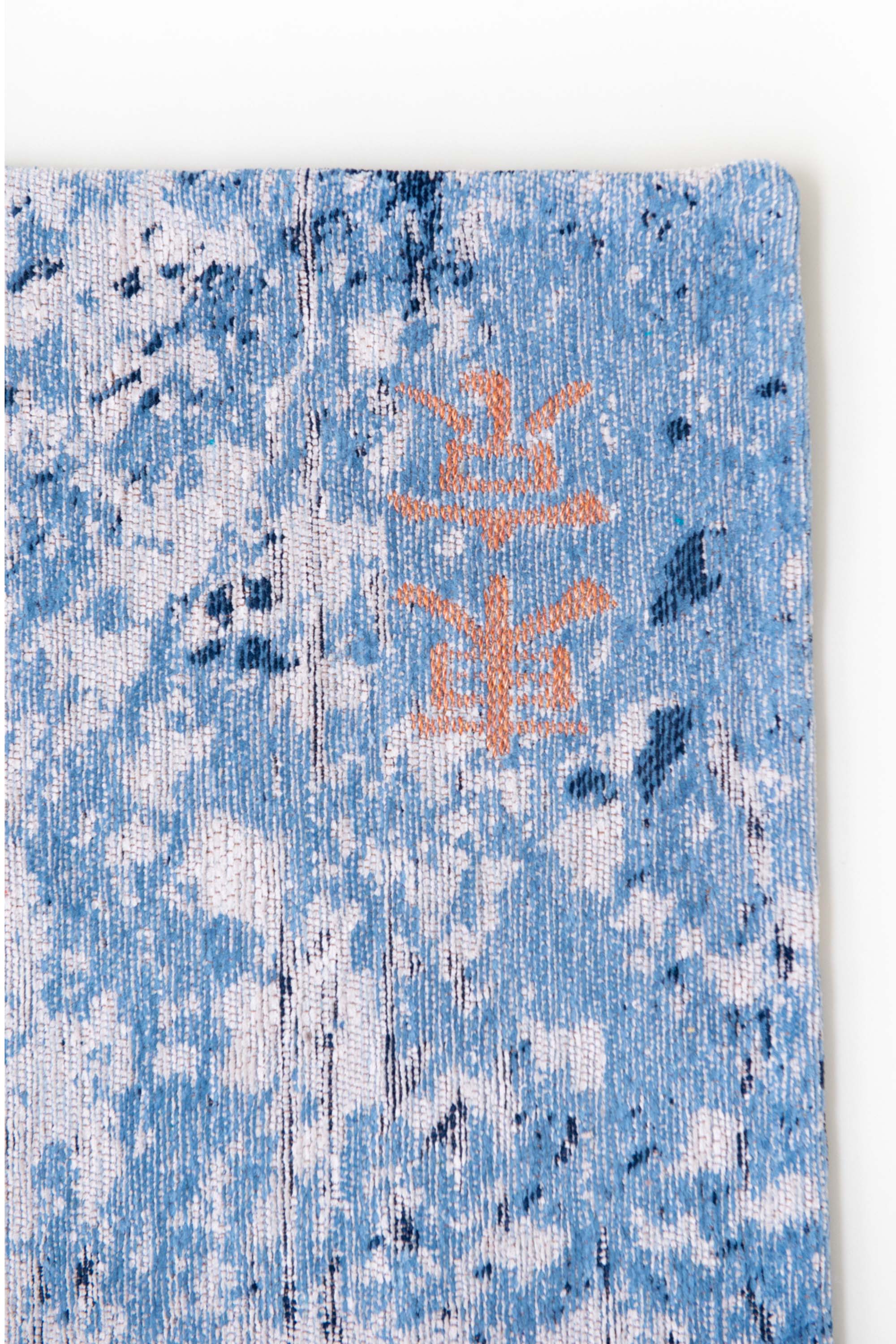 Blue abstract rug with a pattern inspired by the map of Tokyo