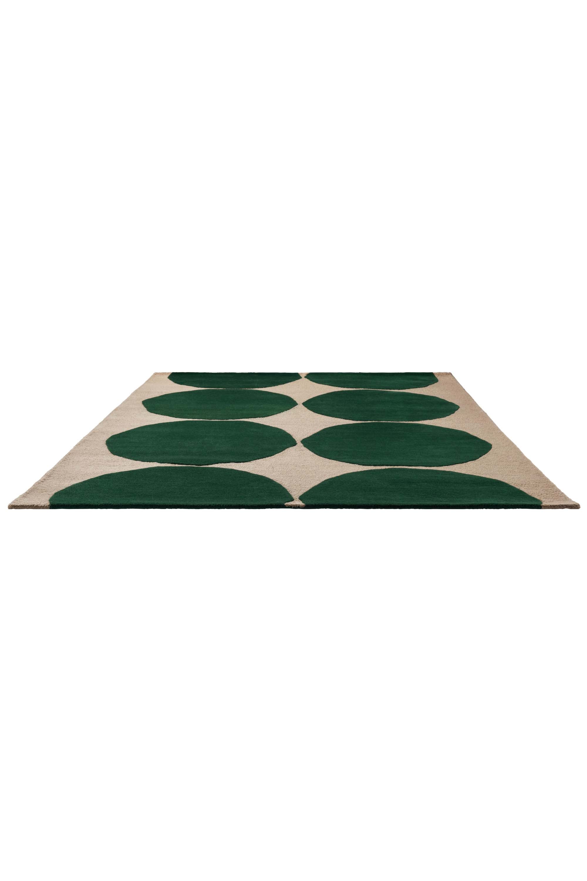 Beige rug with green repeated circle pattern